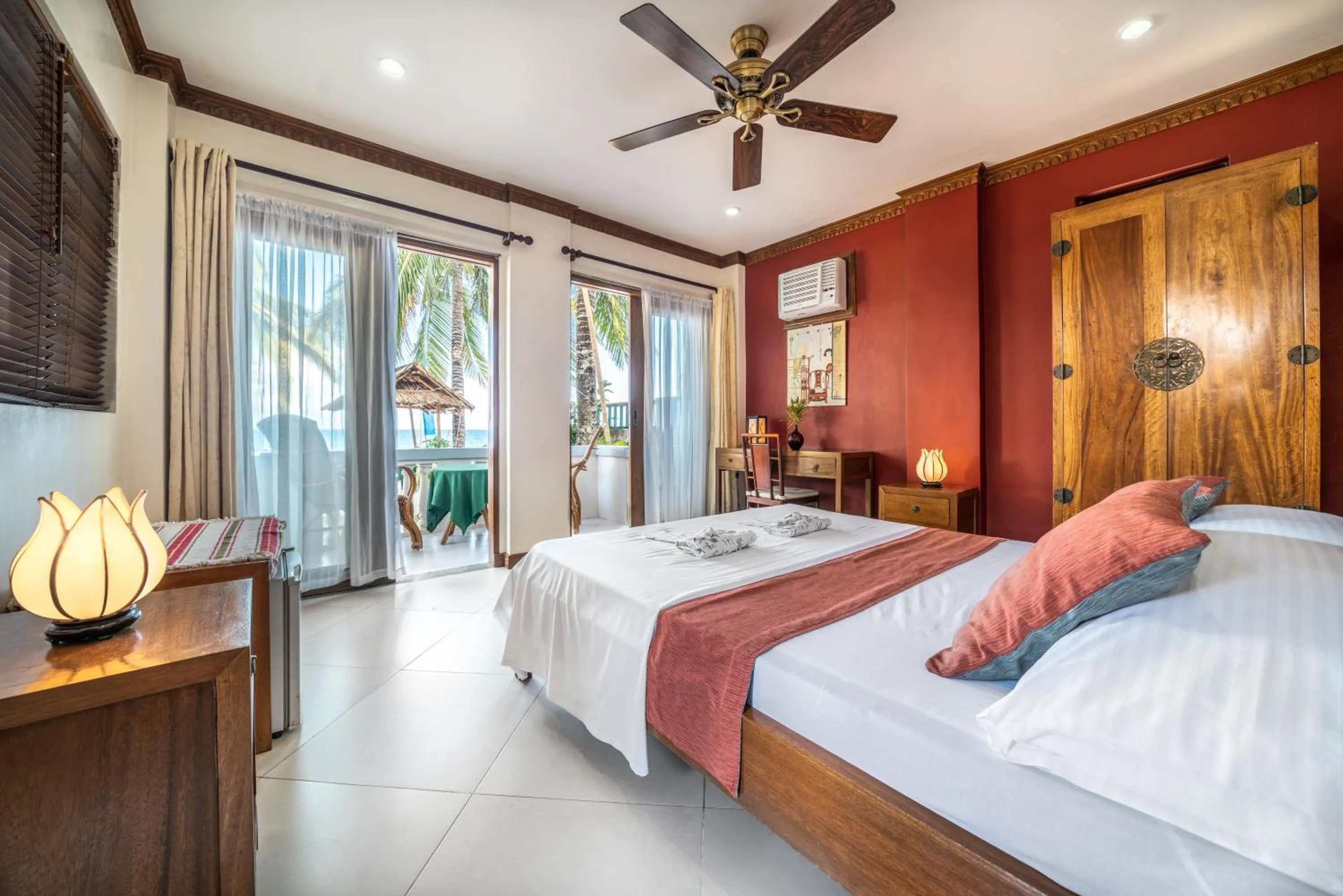 Bed in The Beach House Carabao Island