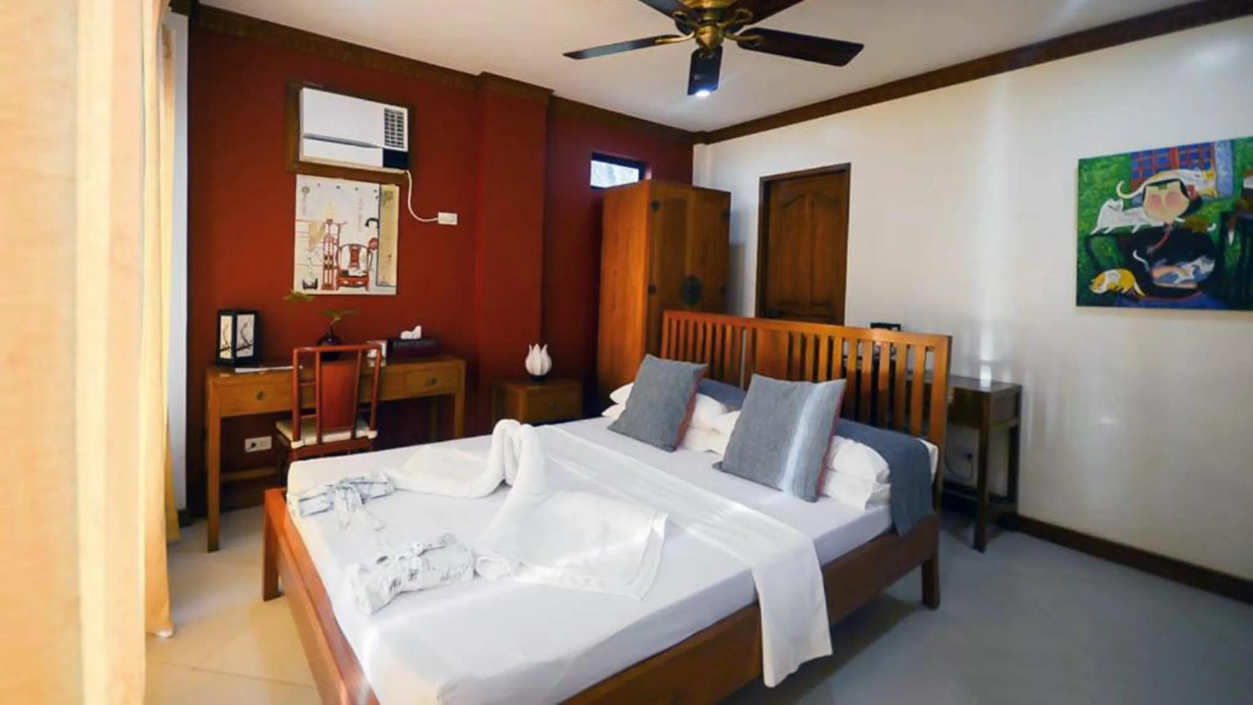 Bed in The Beach House Carabao Island