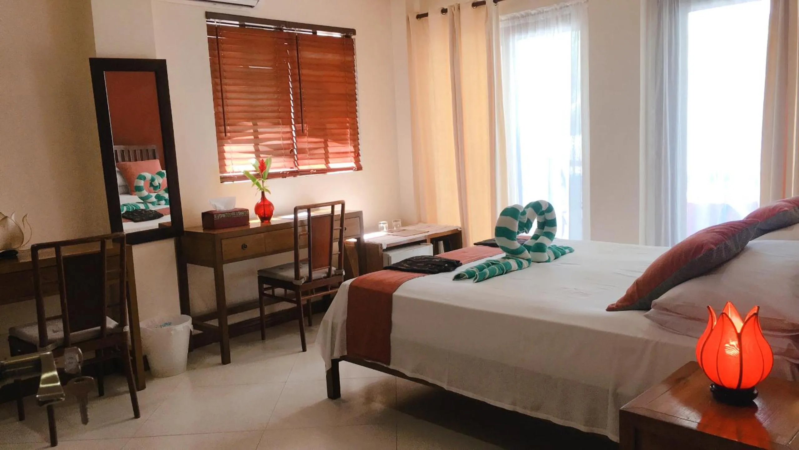 Photo of the whole room, Bed in The Beach House Carabao Island
