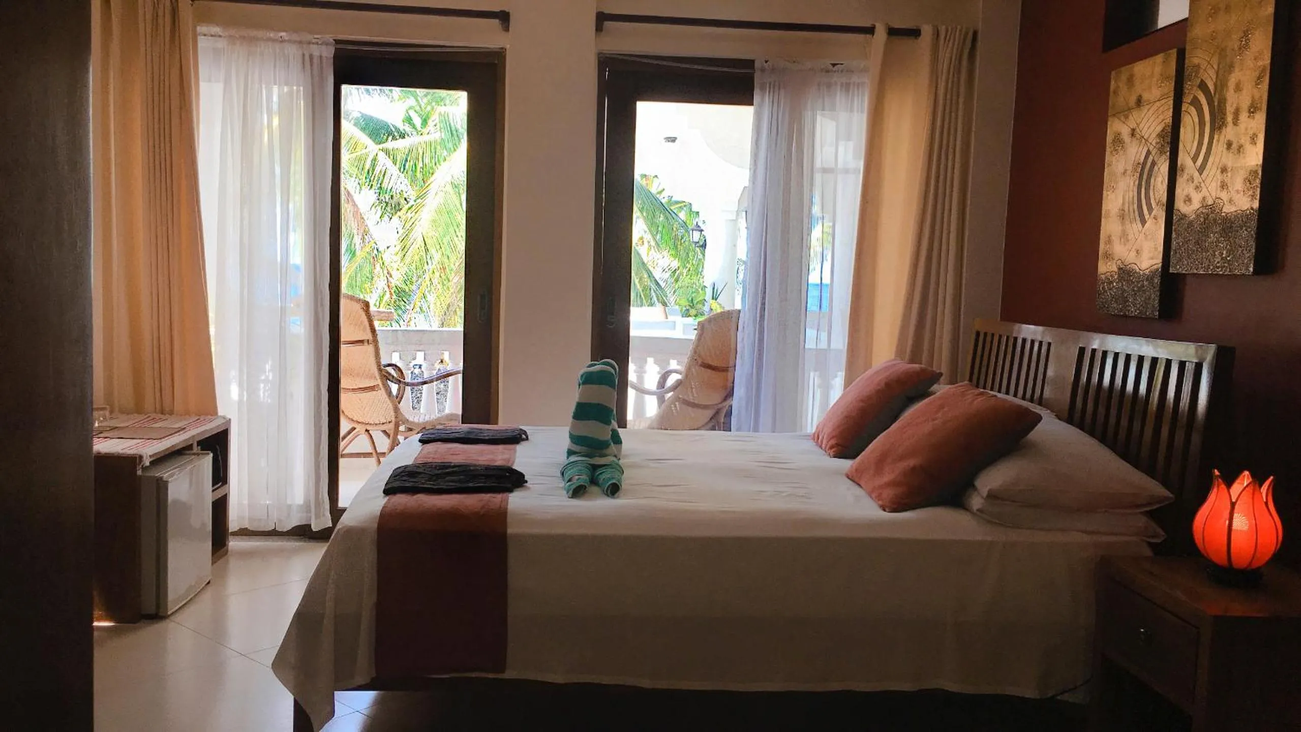 Photo of the whole room, Bed in The Beach House Carabao Island