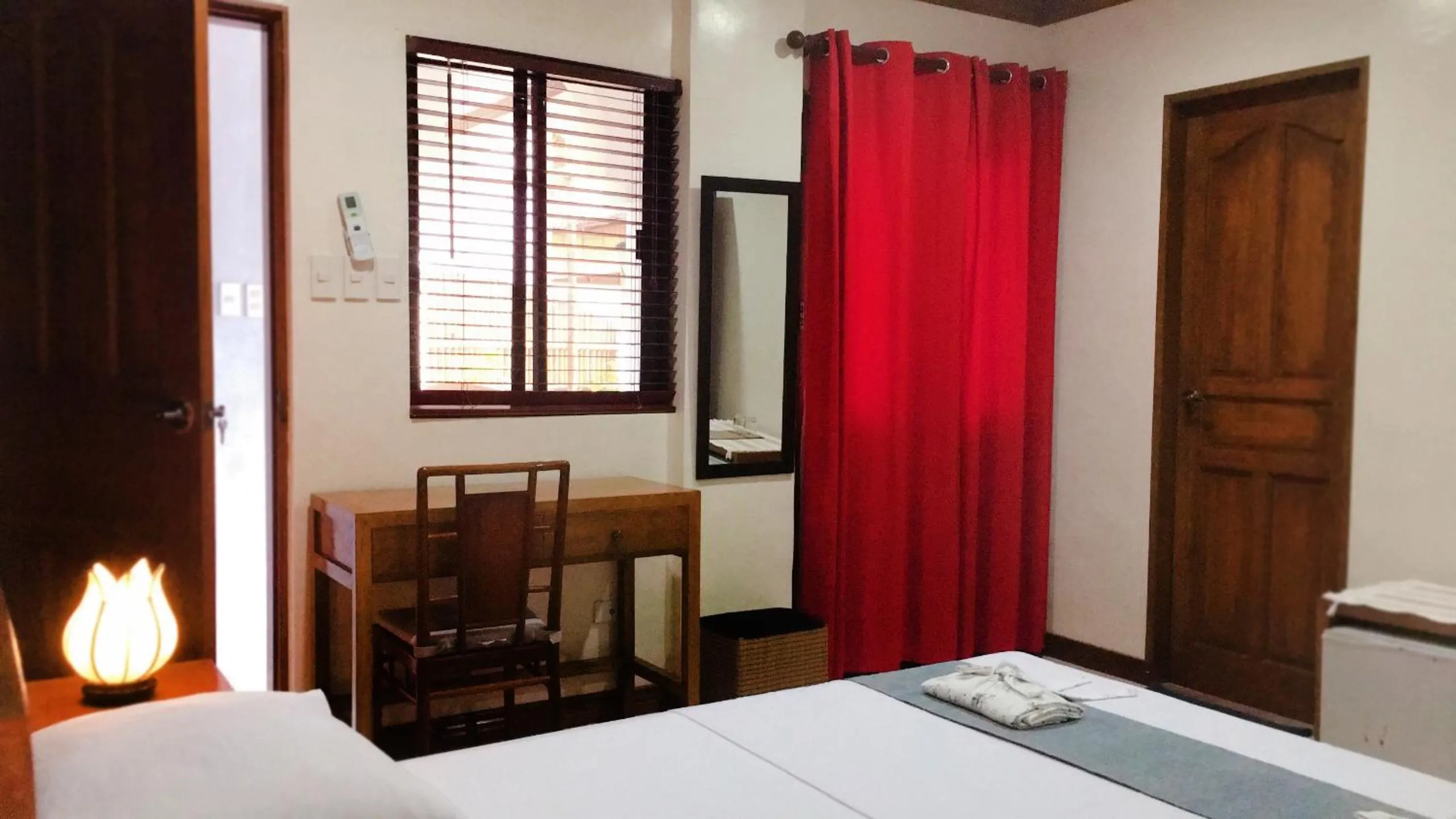 Bed in The Beach House Carabao Island