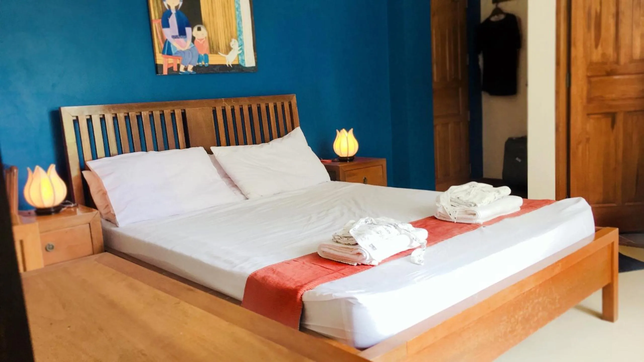 Bed in The Beach House Carabao Island