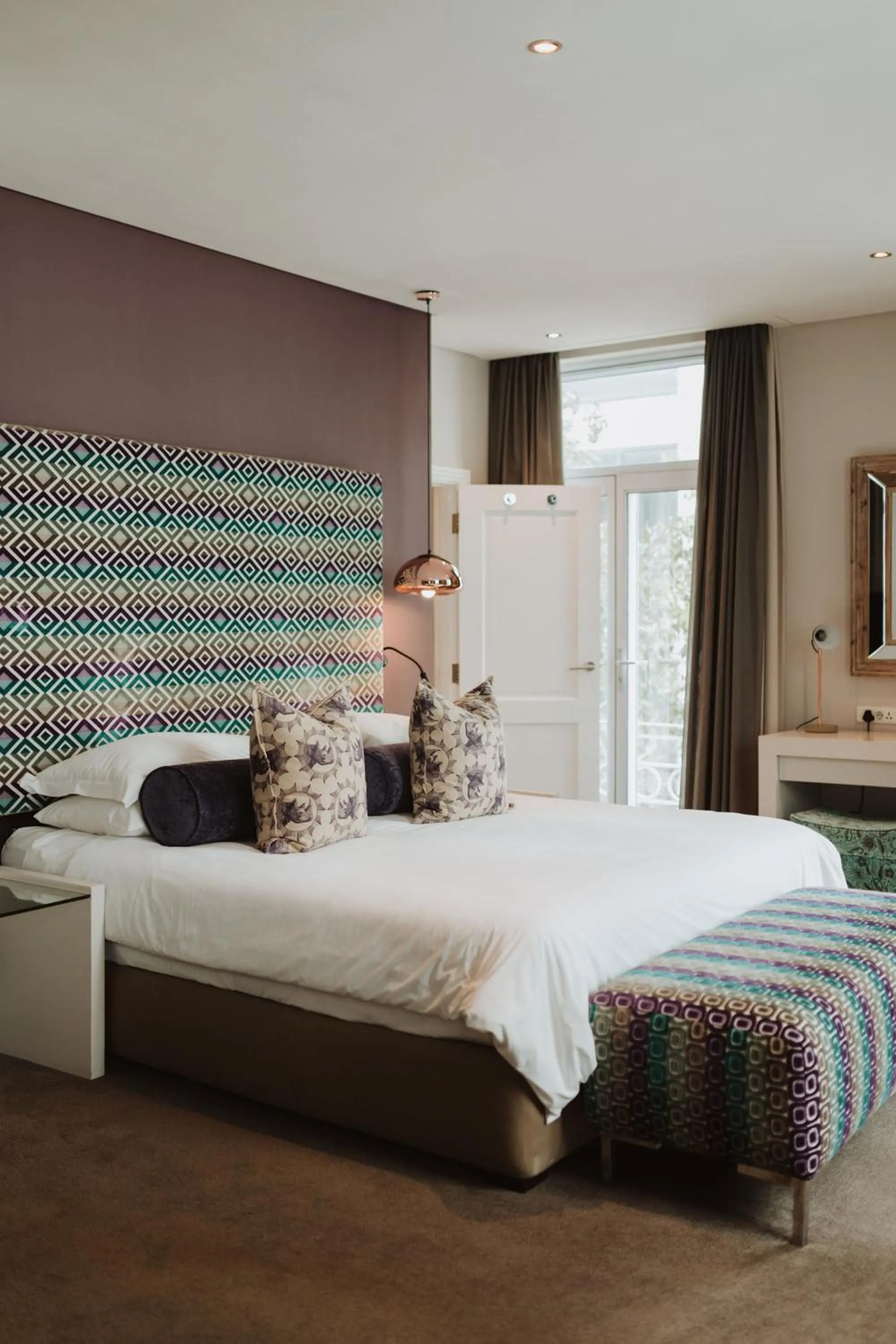 Bed in Grand Daddy Boutique Hotel