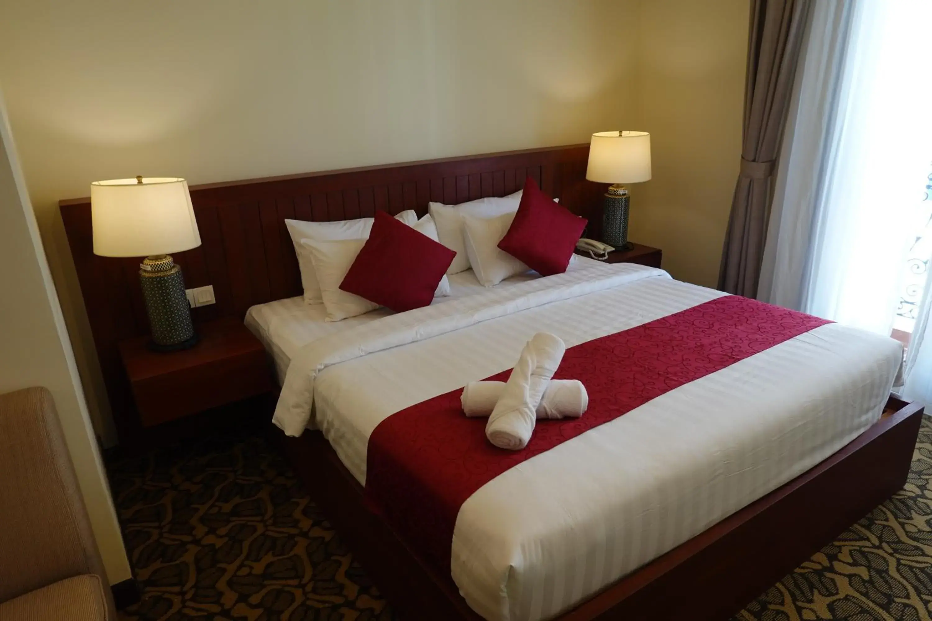 Bed in MM Heritage Hotel Bed in MM Heritage Hotel