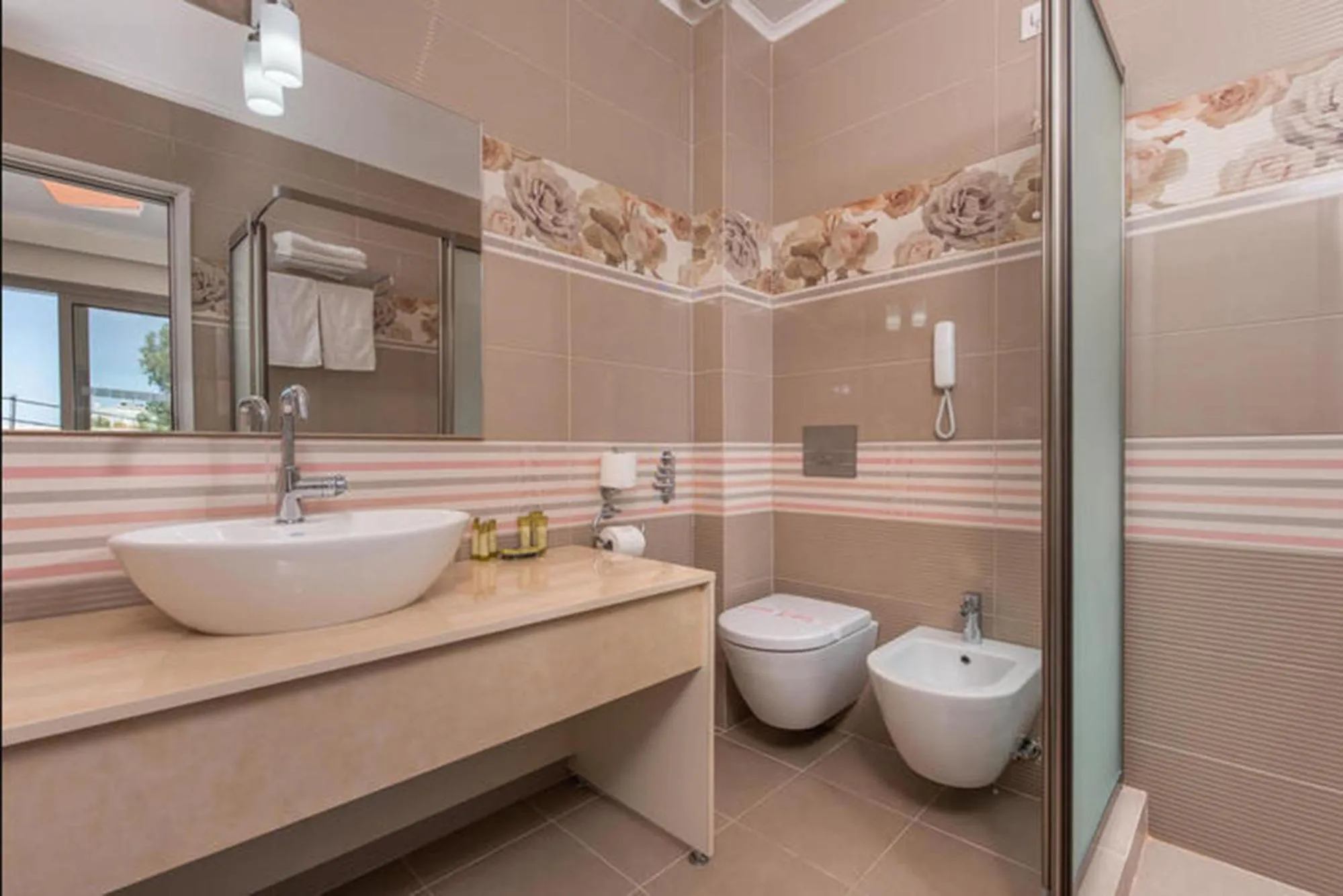 Shower in Dionysos Hotel & Suites