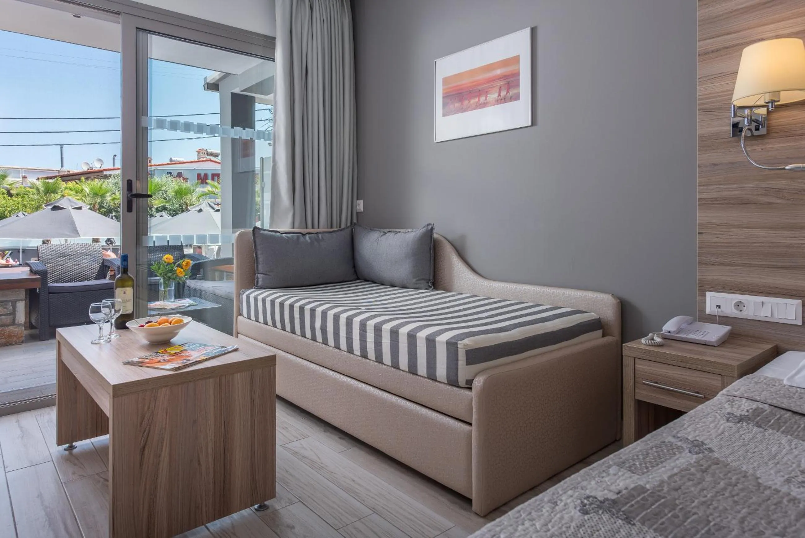 Bed in Dionysos Hotel & Suites