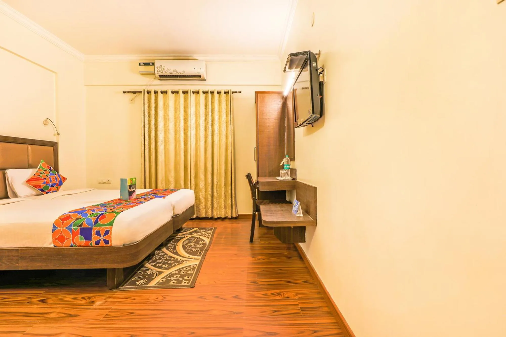 Bedroom, Bed in FabHotel Sri Krishna Suites - Bellandur