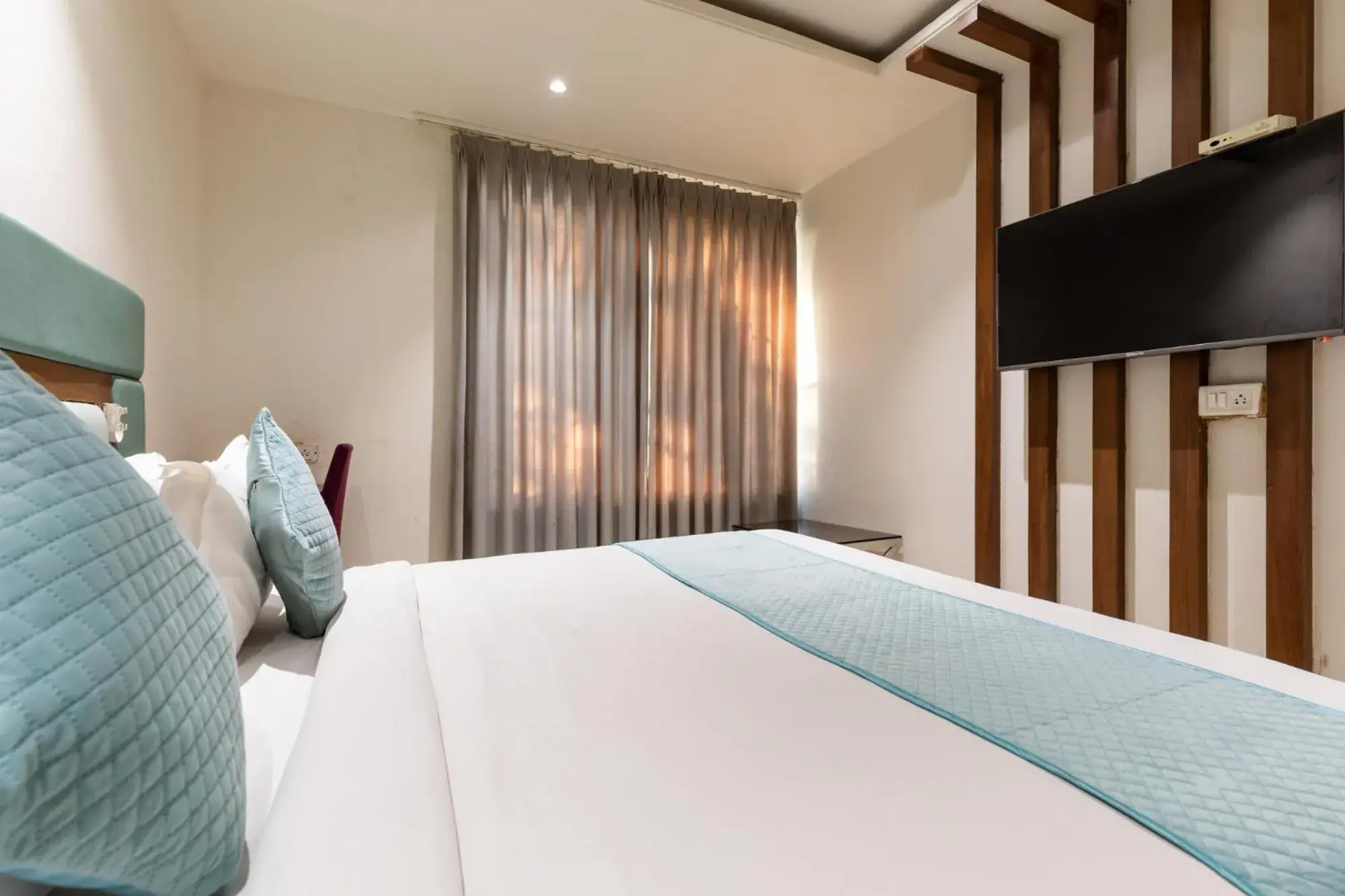 Bed in FabHotel The Oasis Bed in FabHotel The Oasis