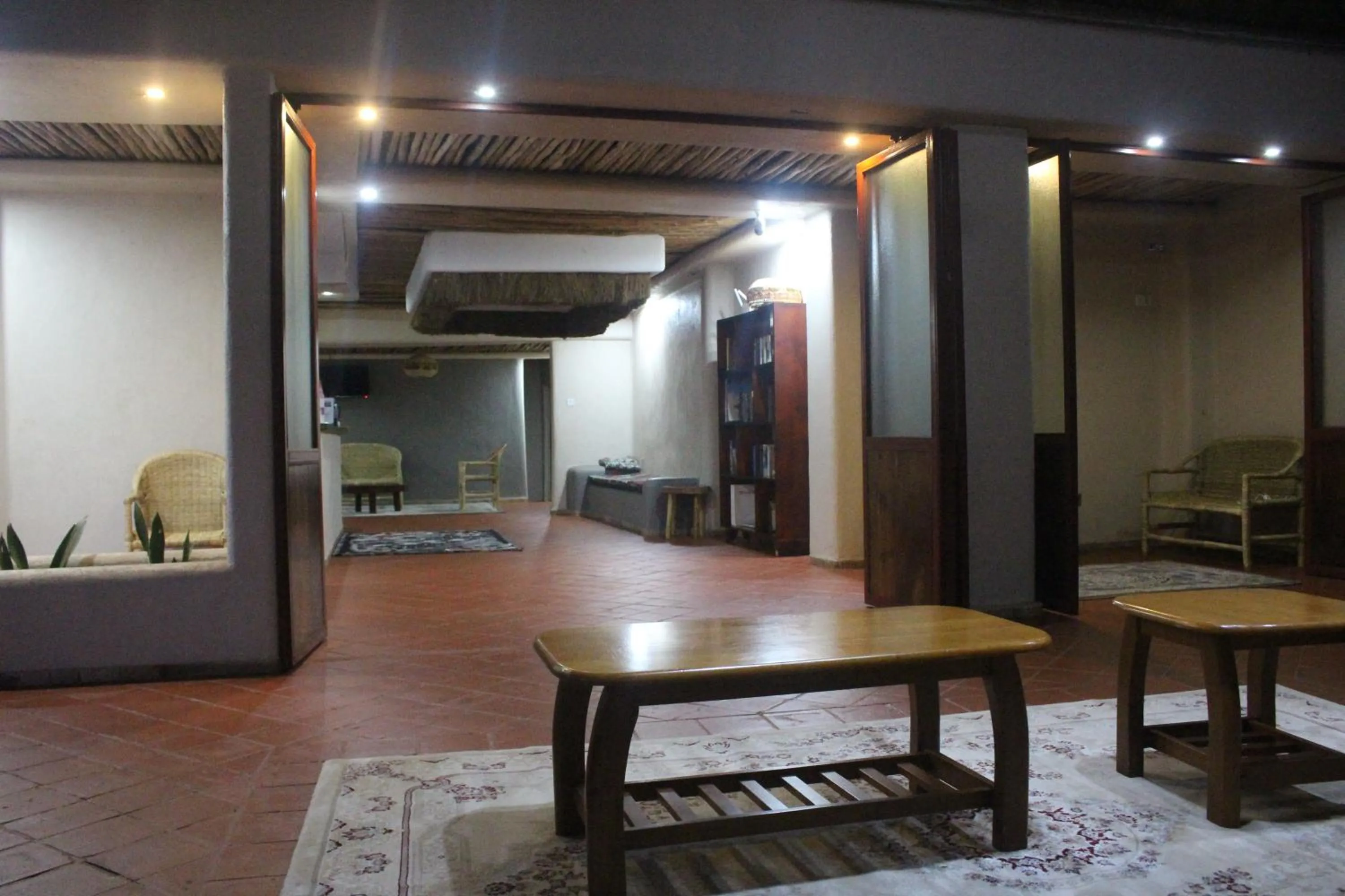 Communal lounge/ TV room in Montane Safaris Hotel, Entebbe