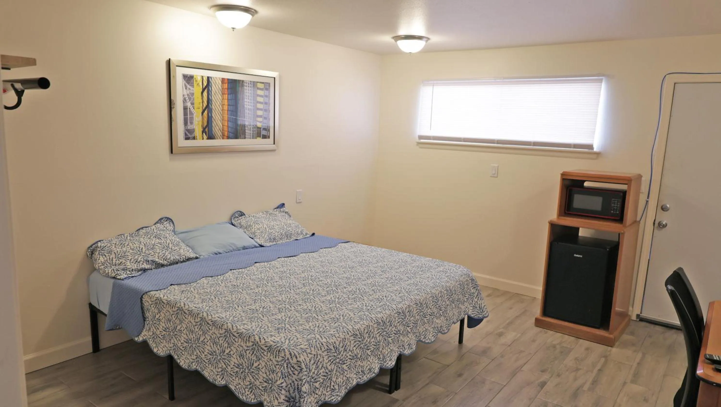 Bed in Sawmill Lodges Motel