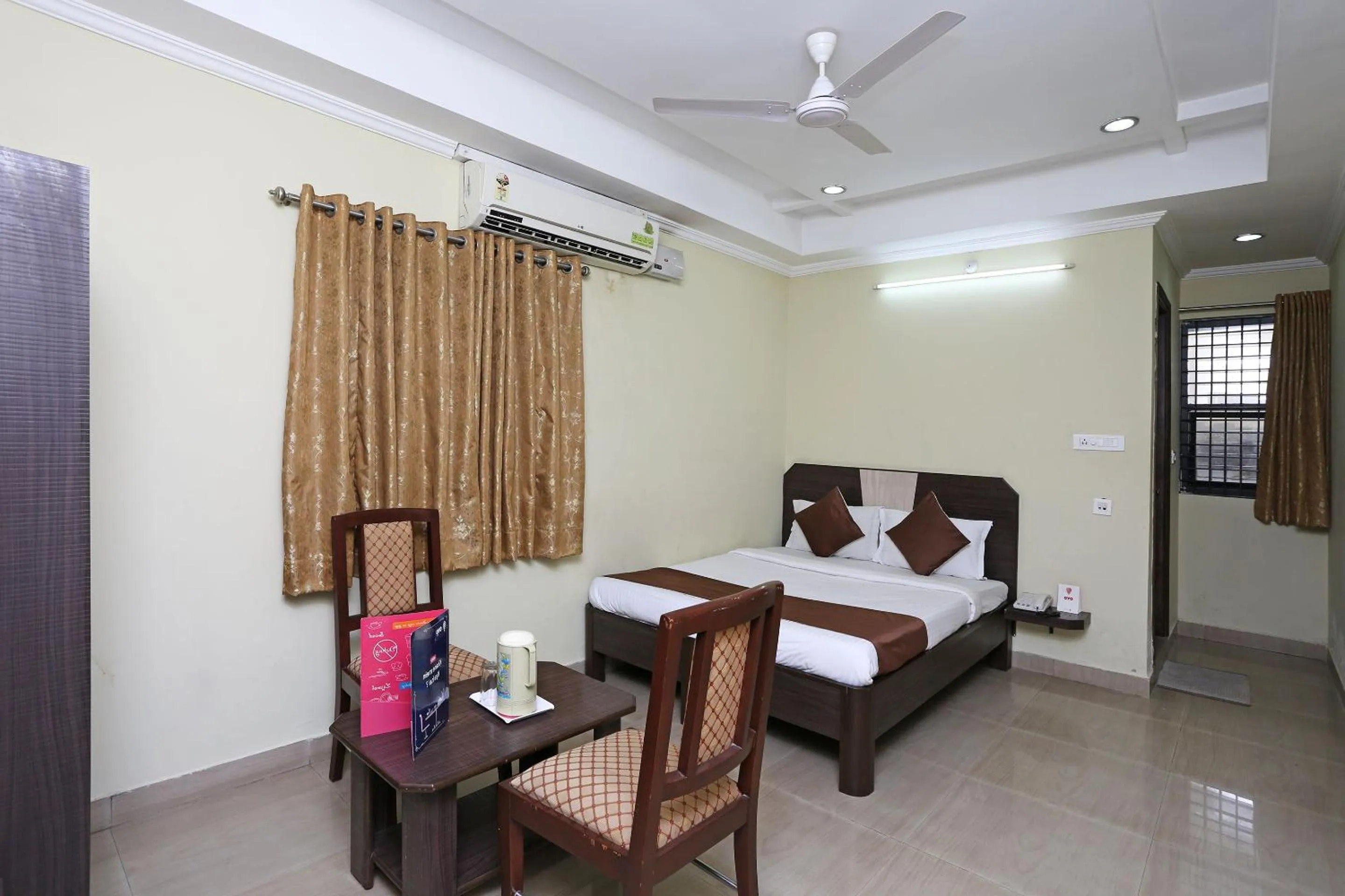 Bedroom, Bed in Hotel O Saraswathi Residency Near SR Nagar Metro Station