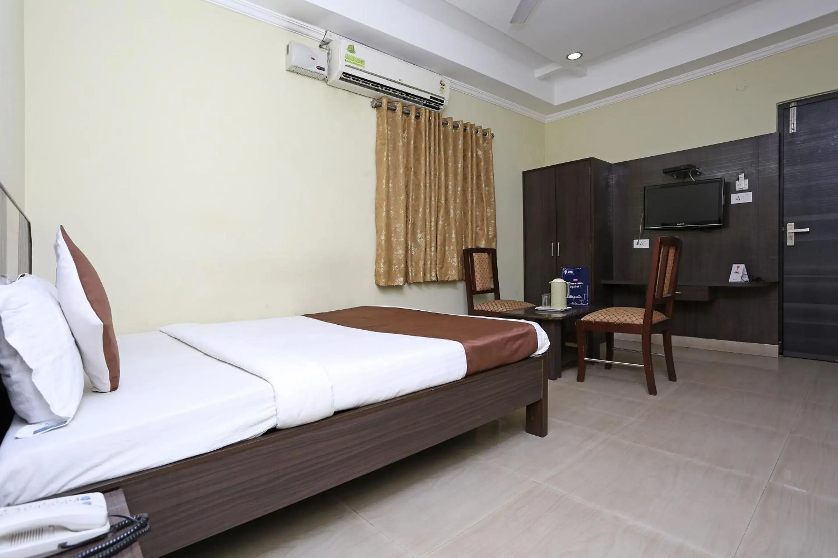 Bedroom, Bed in Hotel O Saraswathi Residency Near SR Nagar Metro Station Bedroom, Bed in Hotel O Saraswathi Residency Near SR Nagar Metro Station