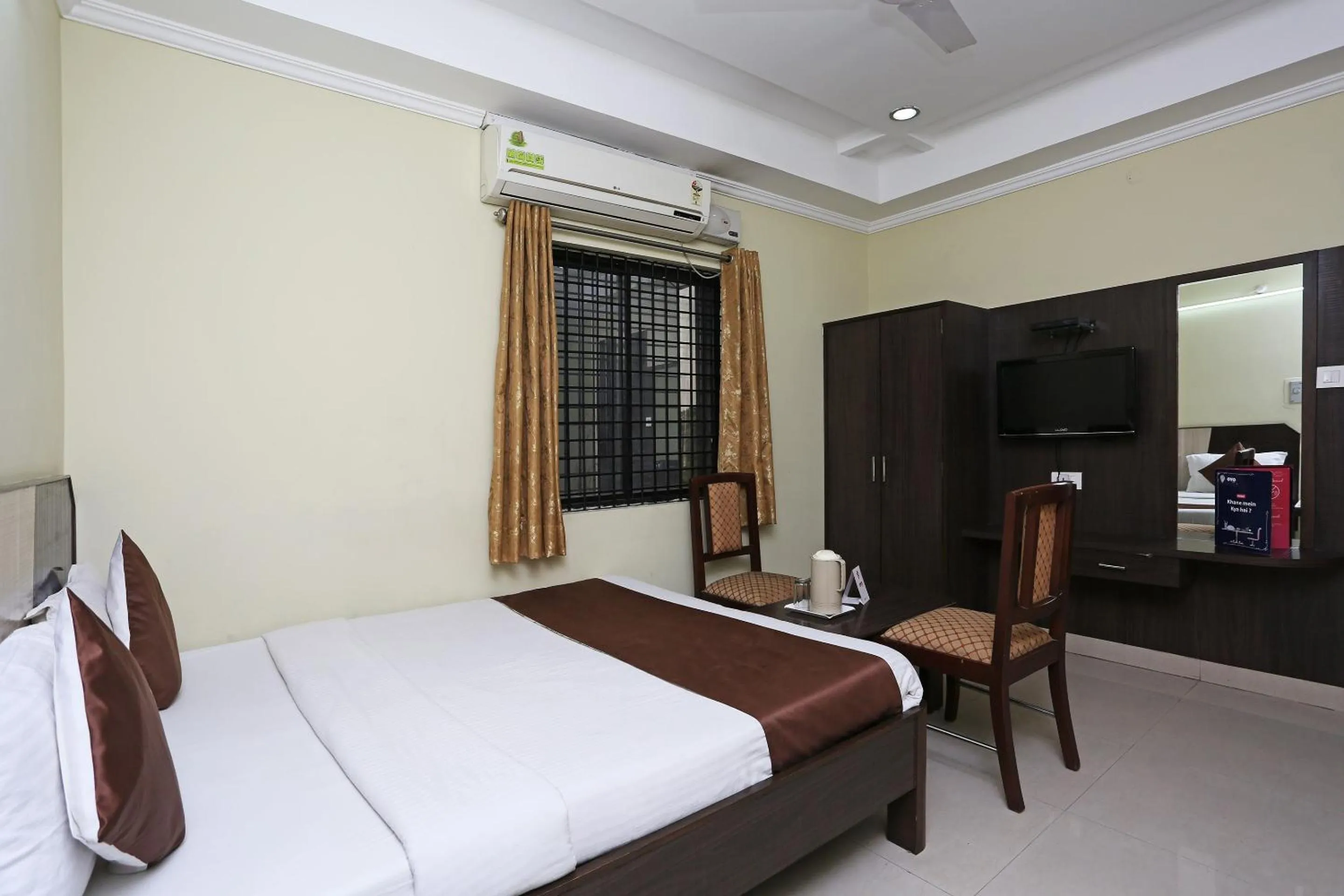 Bedroom, Bed in Hotel O Saraswathi Residency Near SR Nagar Metro Station