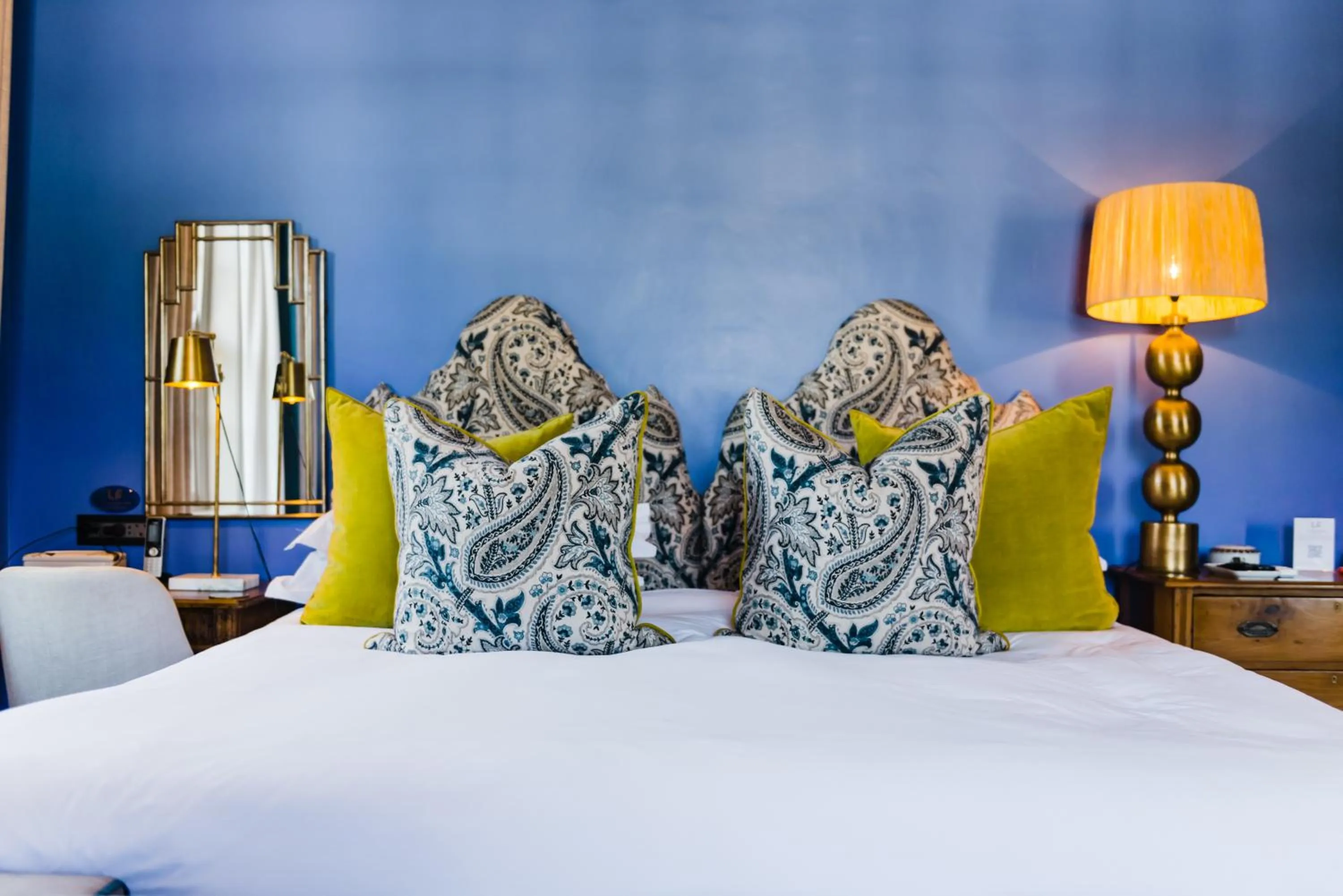 Bed in La Fontaine Boutique Hotel by The Oyster Collection