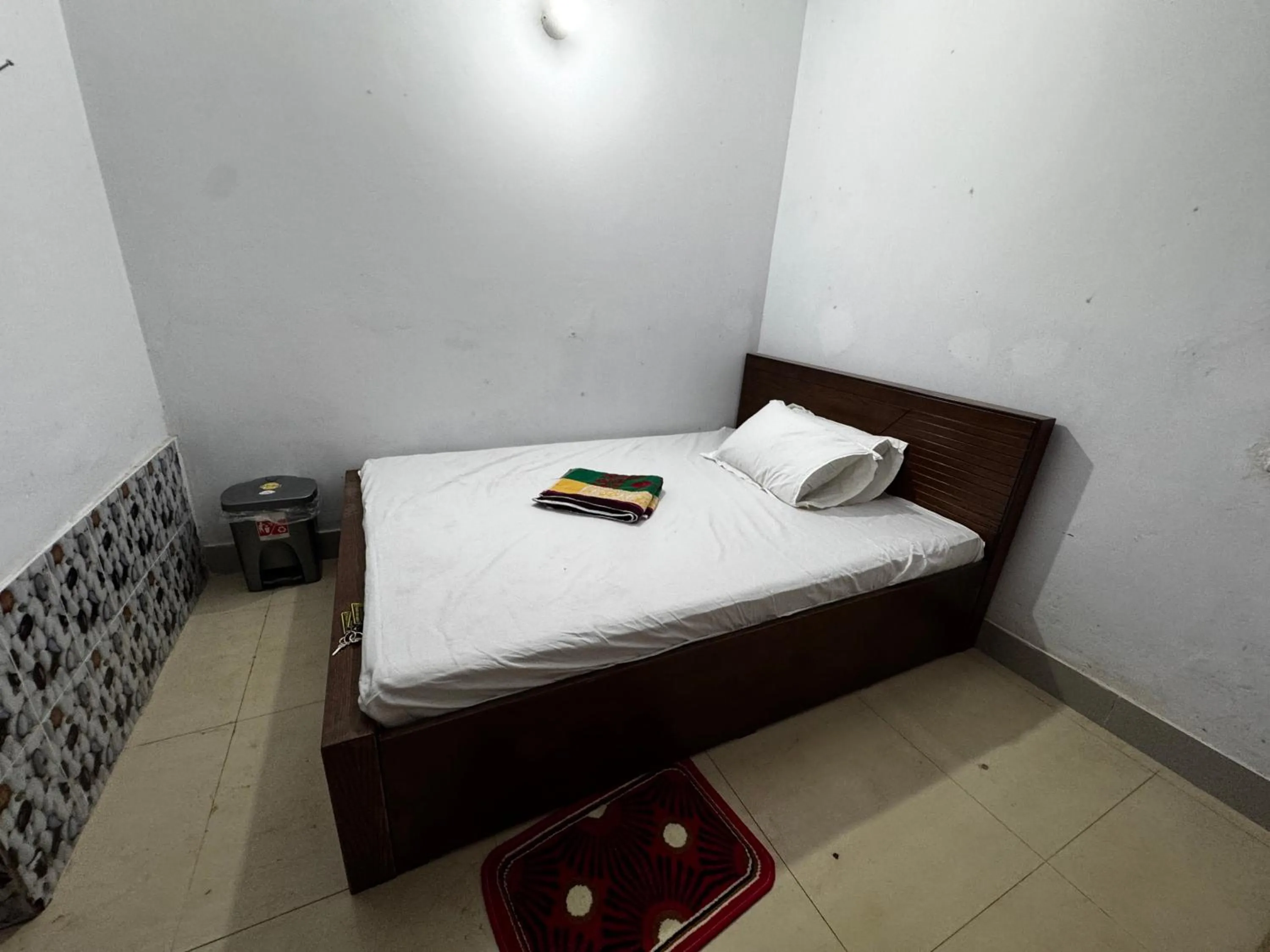 Bed in Hotel Labbaik Farmgate