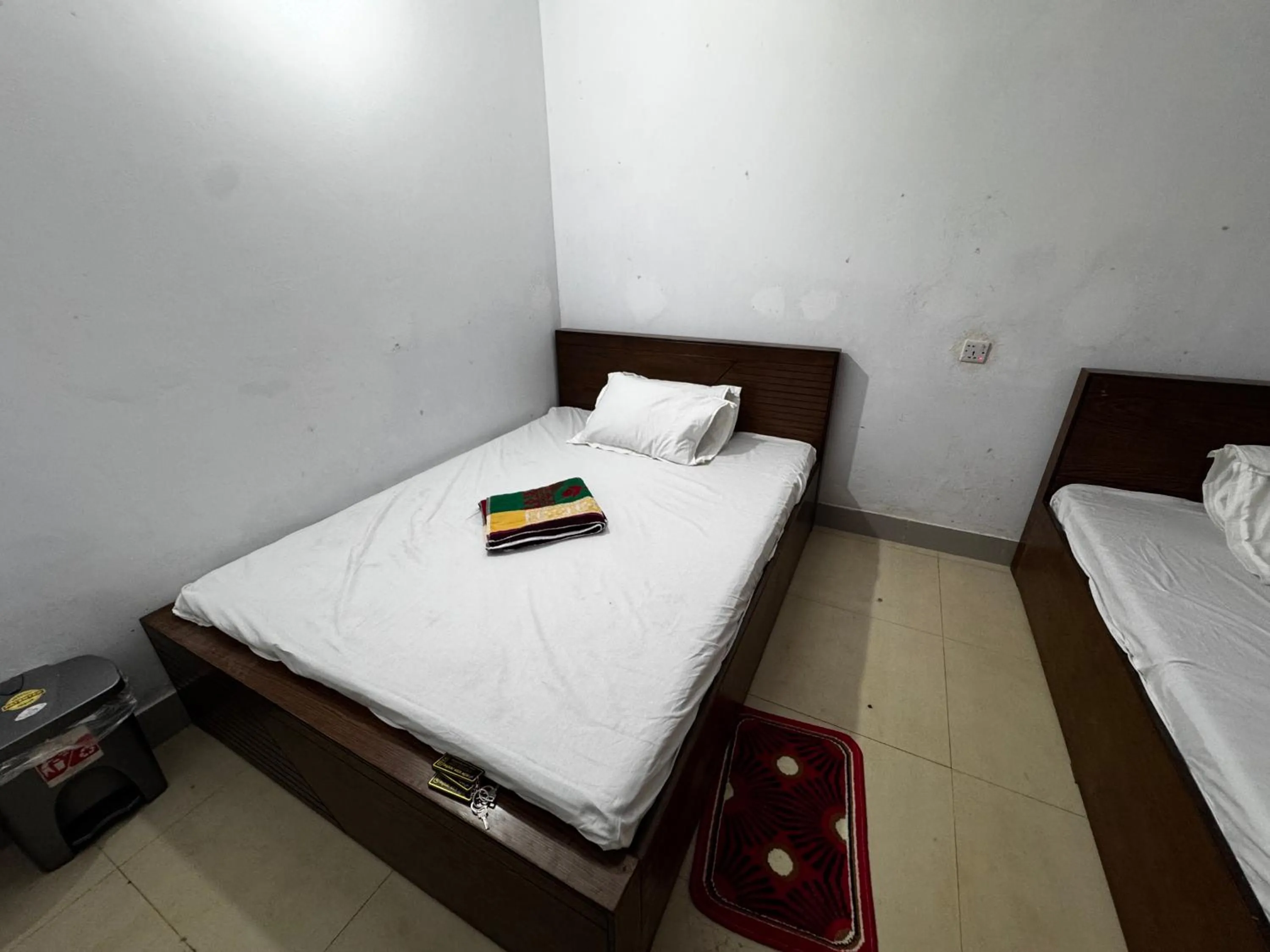 Bed in Hotel Labbaik Farmgate