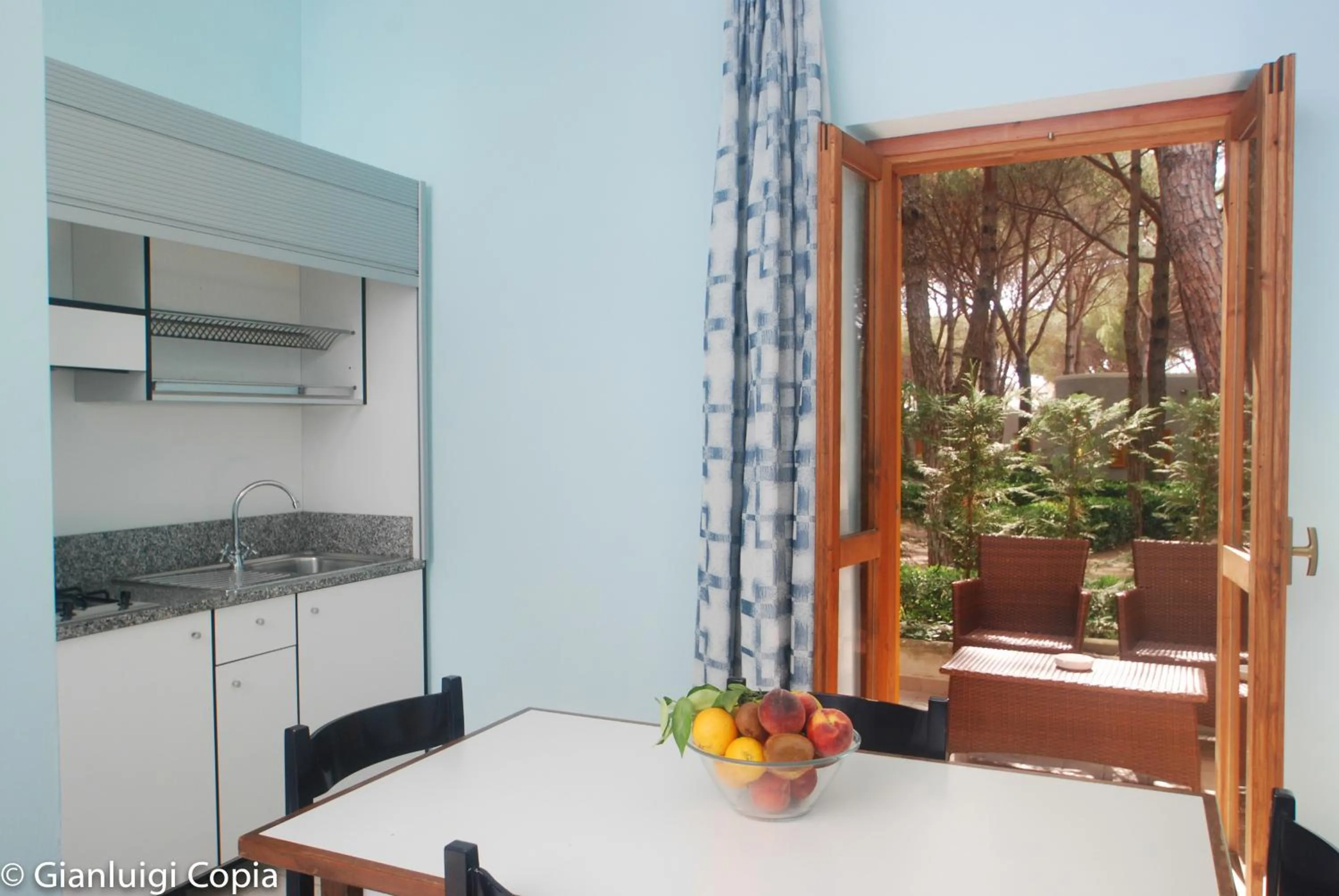 Kitchen or kitchenette in Villaggio Turistico La Mantinera - Residence