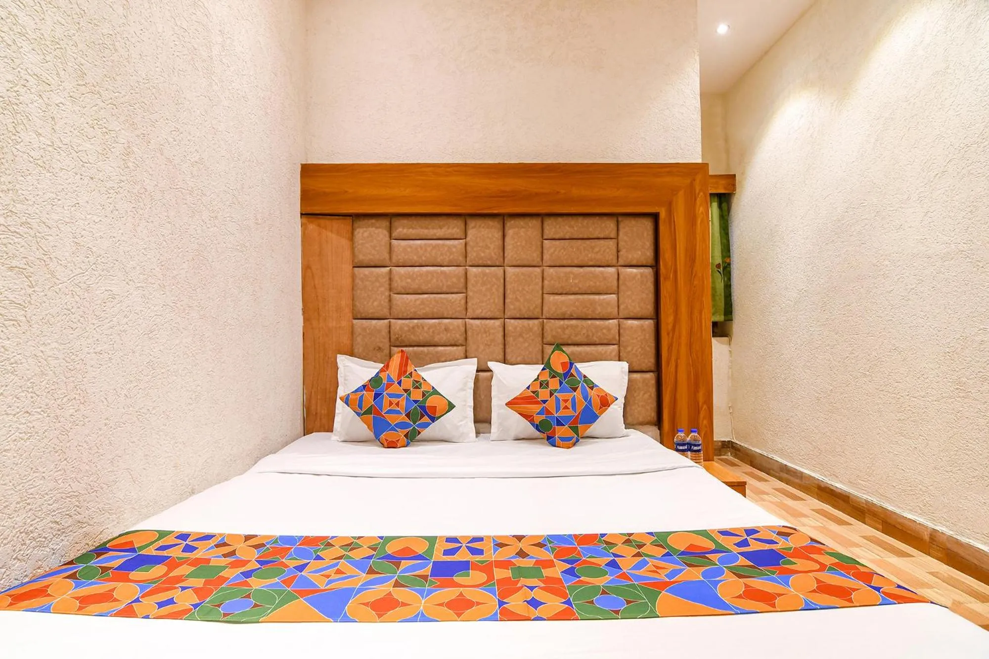 Bed in FabHotel Marina