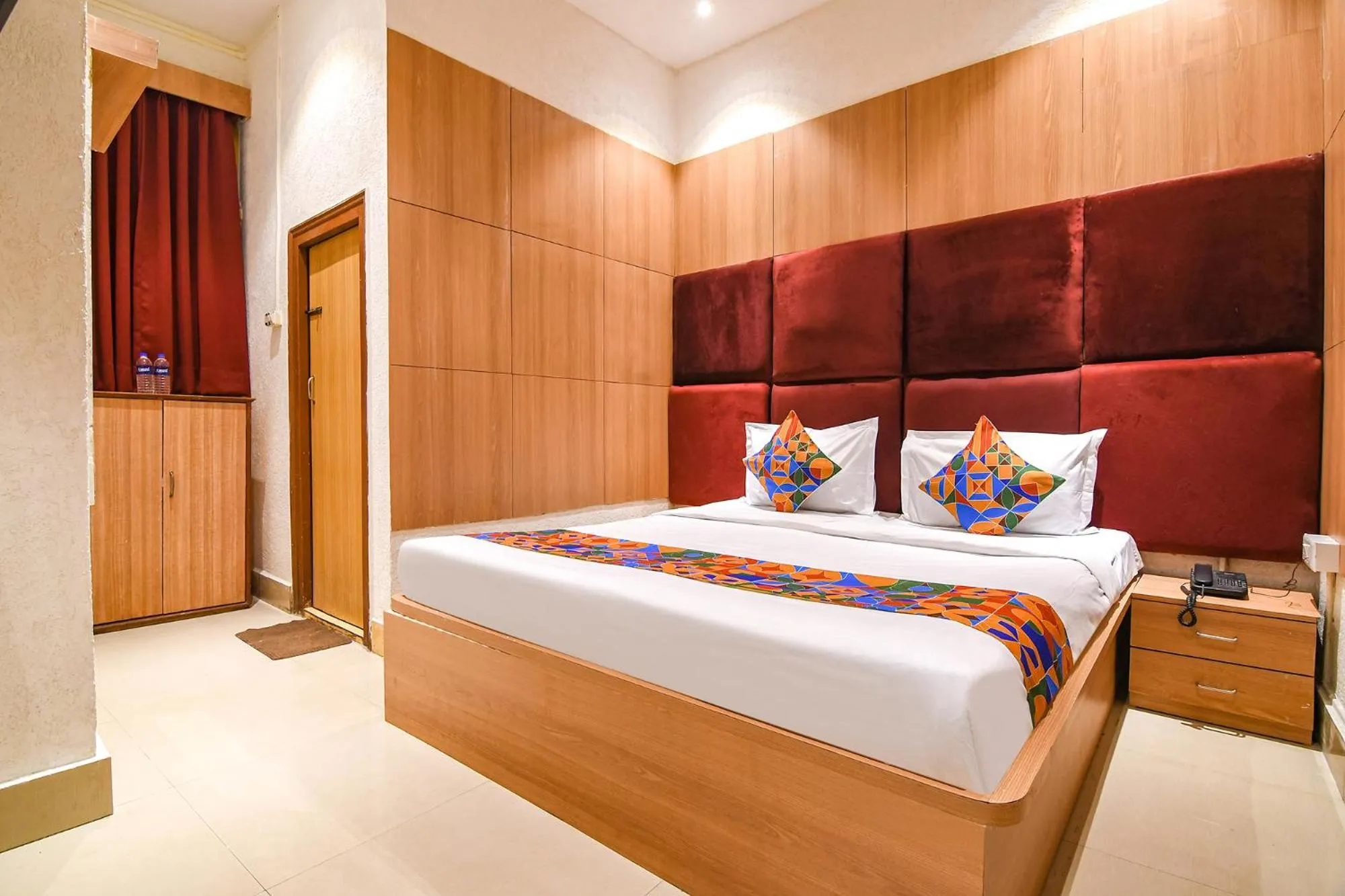 Bed in FabHotel Marina