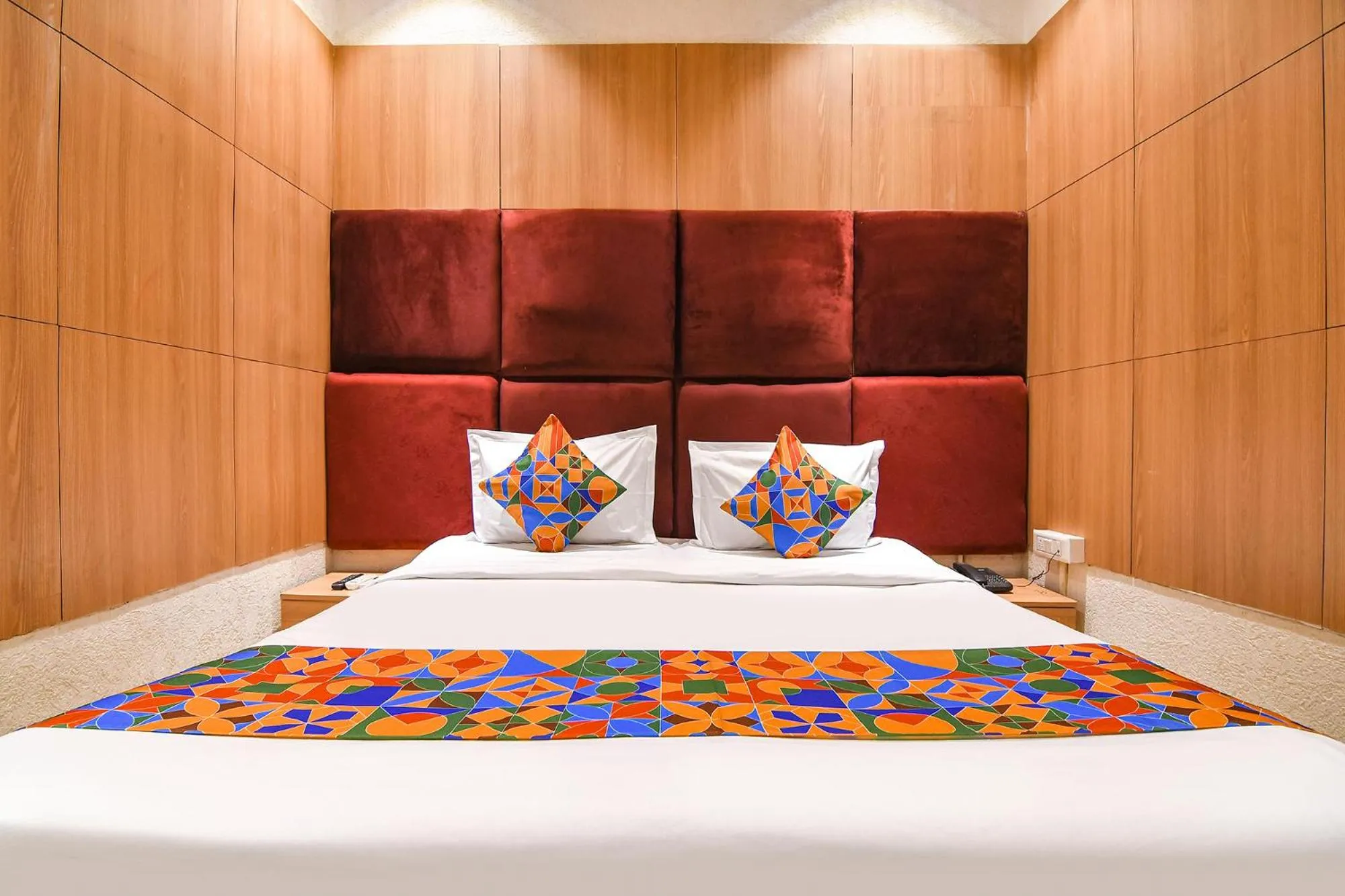 Bed in FabHotel Marina