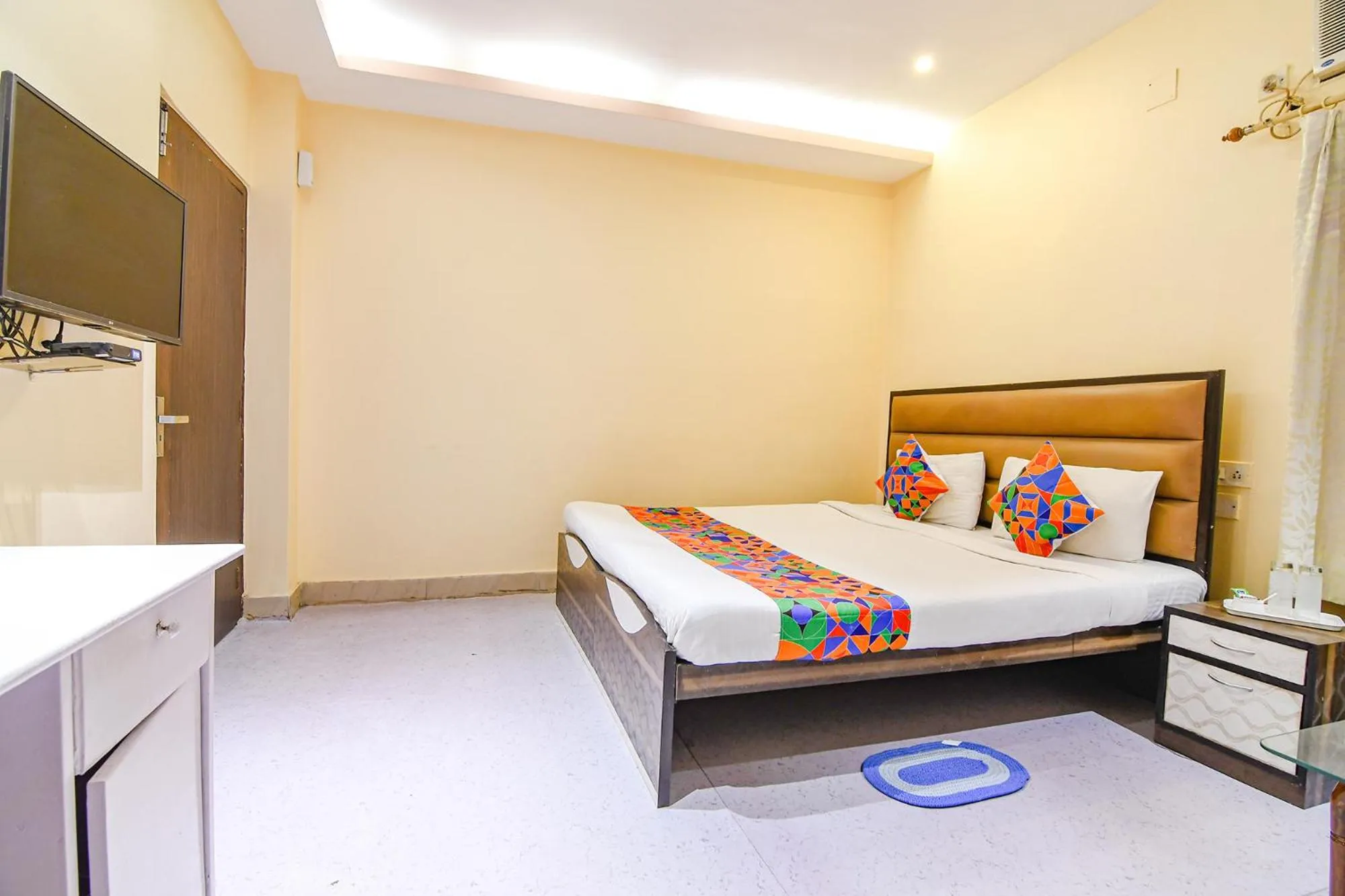 Bed in FabHotel Aayash - Nr City Center Metro Station