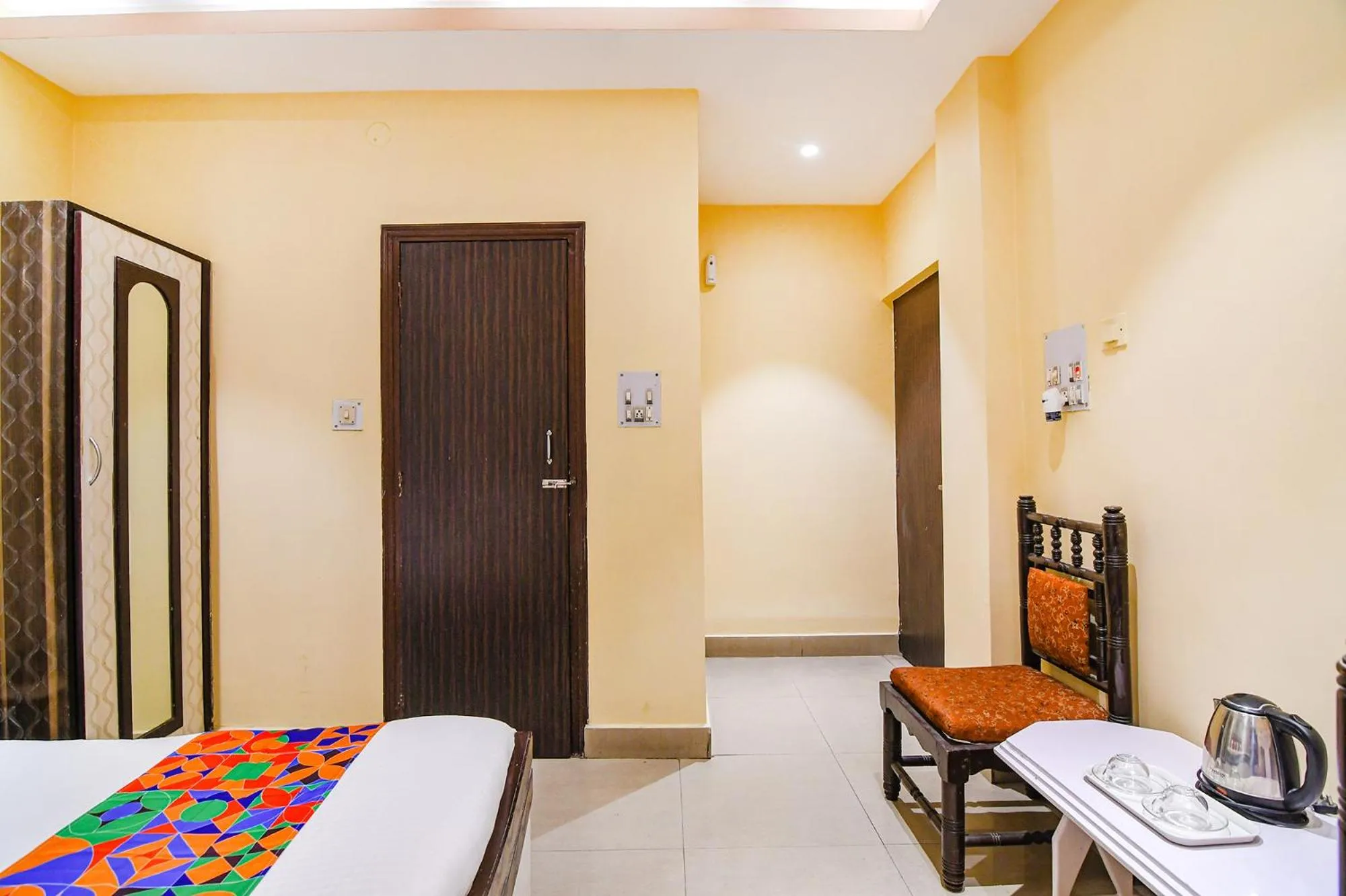 Bed in FabHotel Aayash - Nr City Center Metro Station