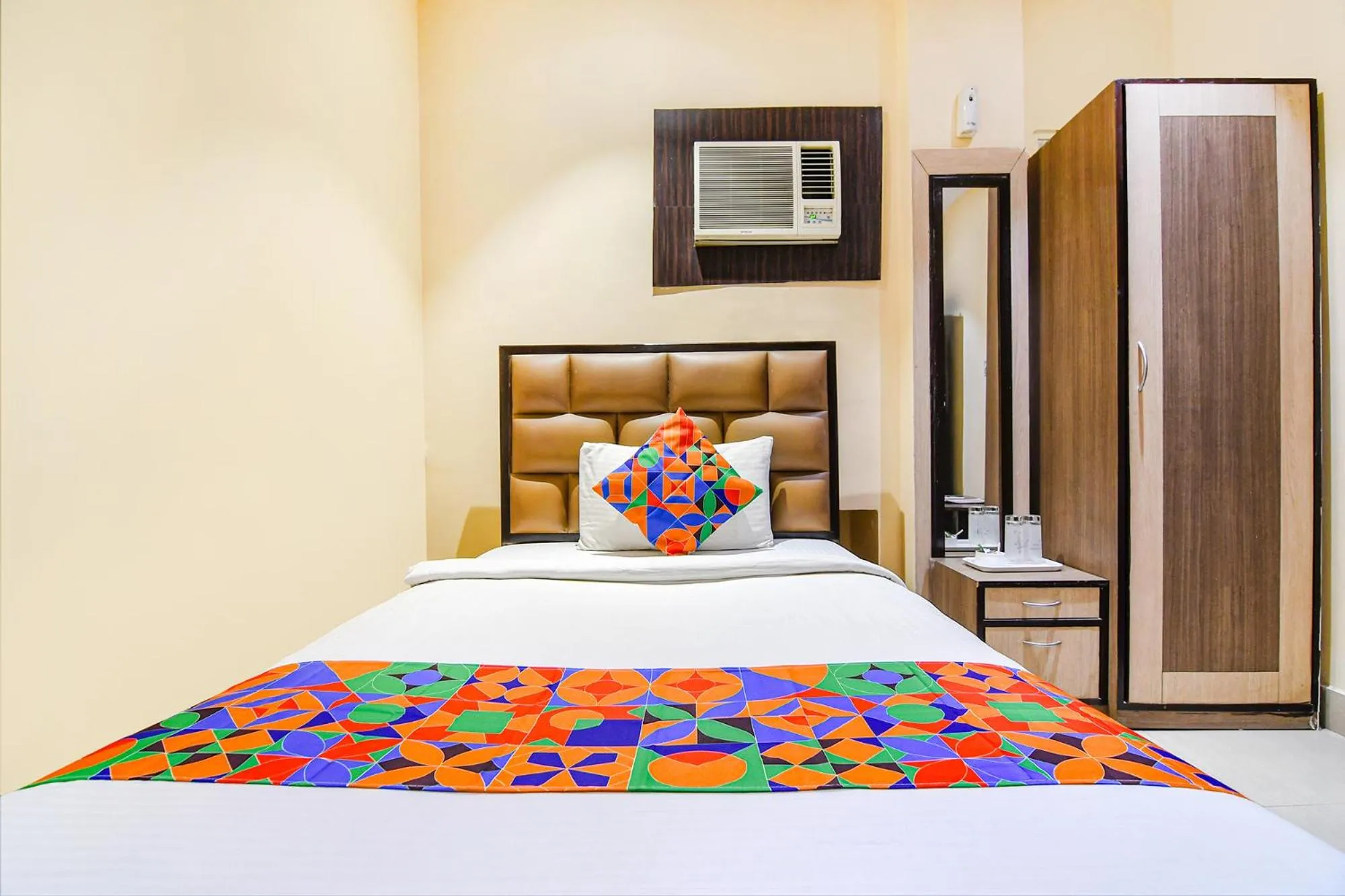 Bed in FabHotel Aayash - Nr City Center Metro Station
