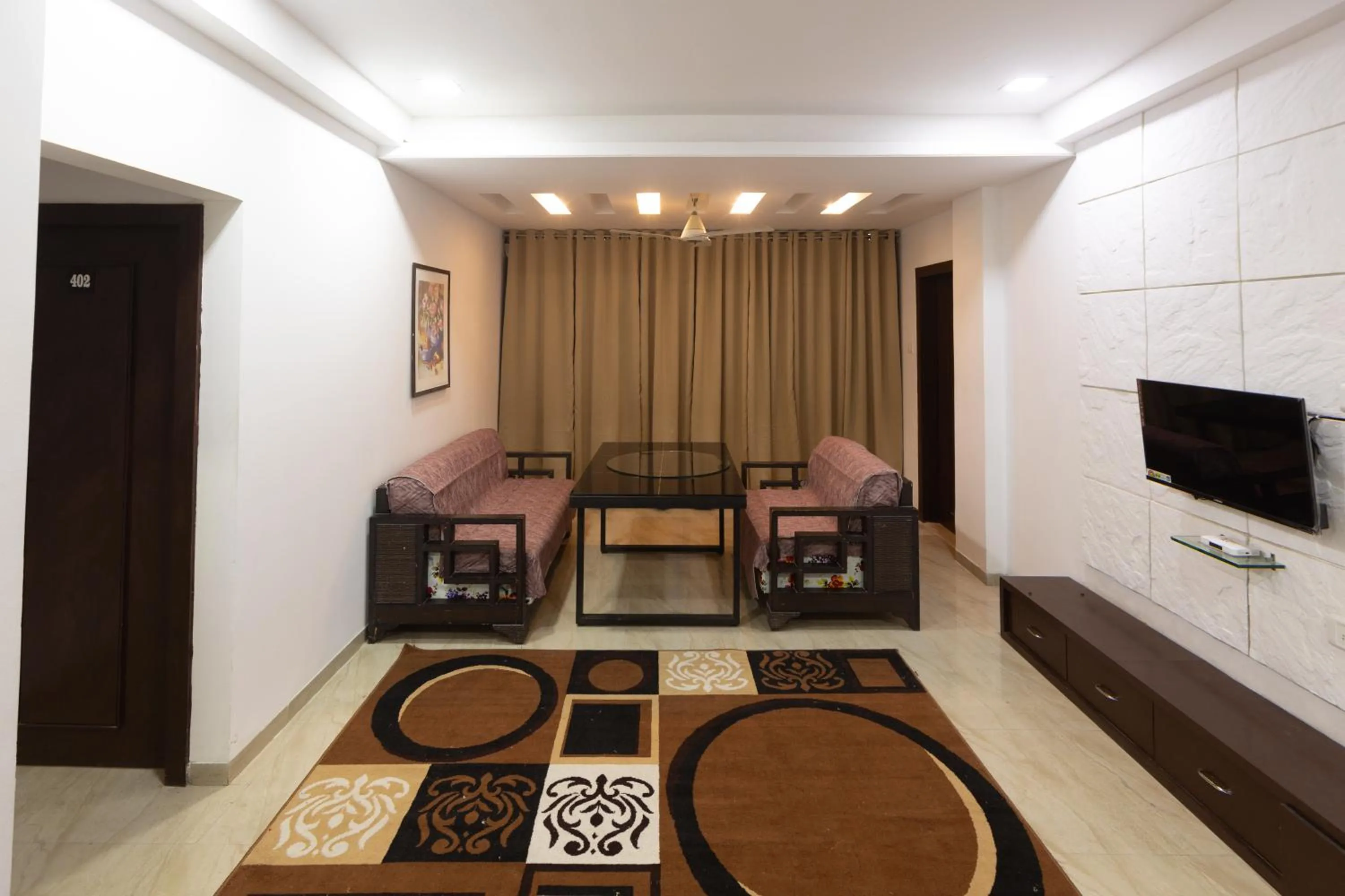 Seating area in Treebo Shembekars Inn