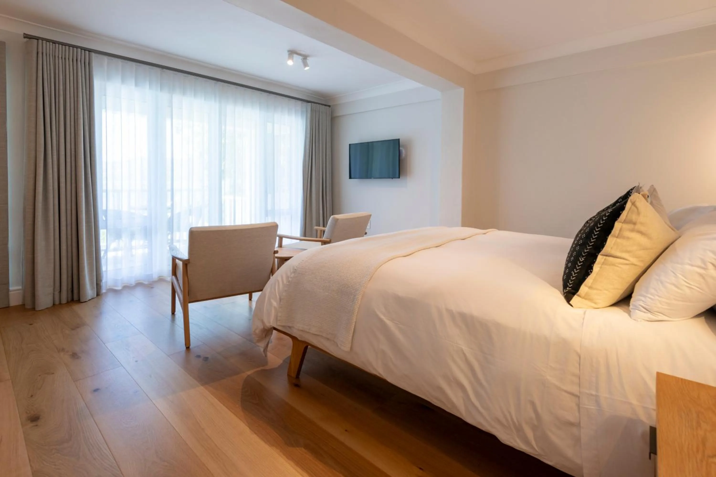 Bed in Hide-Away Guest House