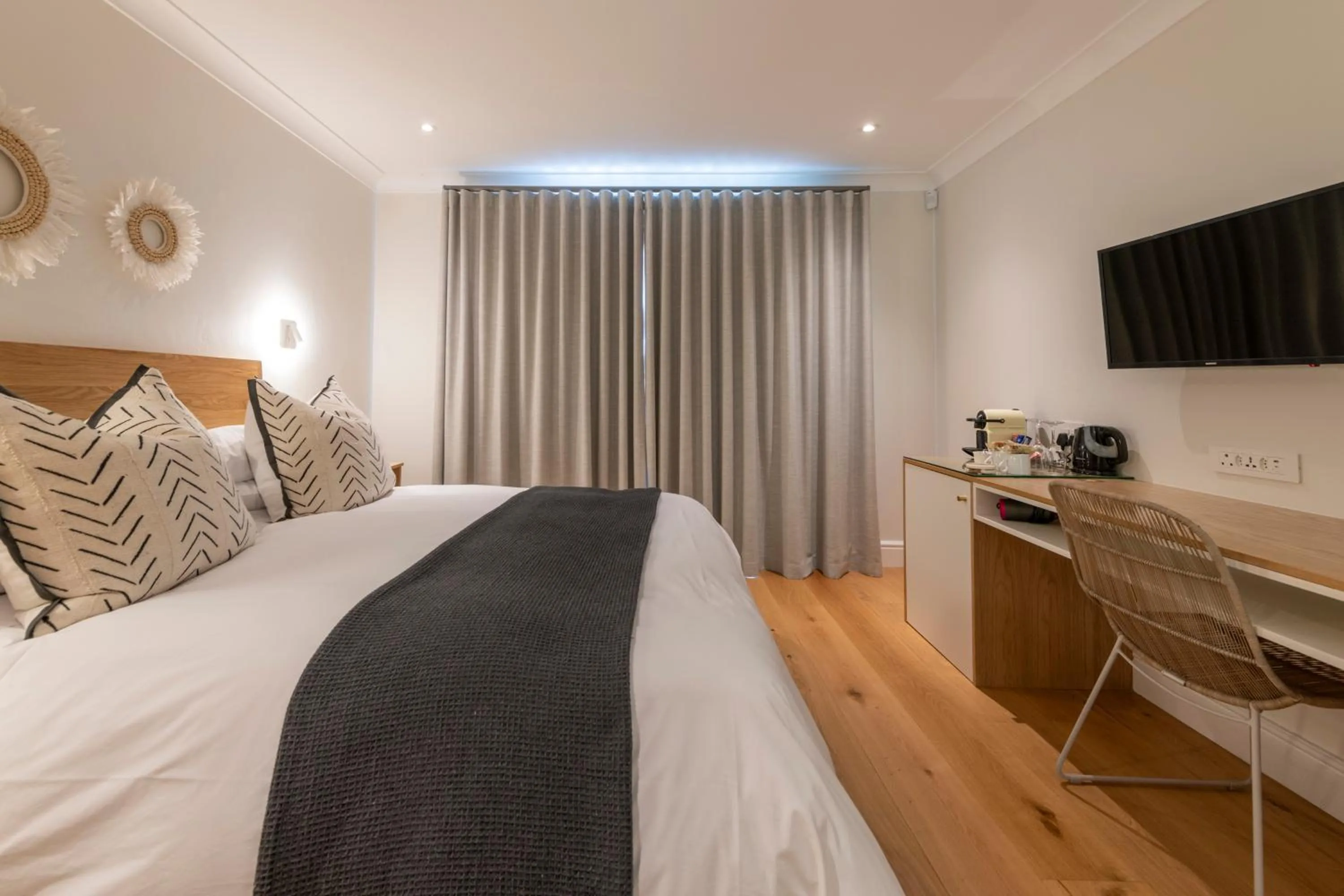 Bed in Hide-Away Guest House