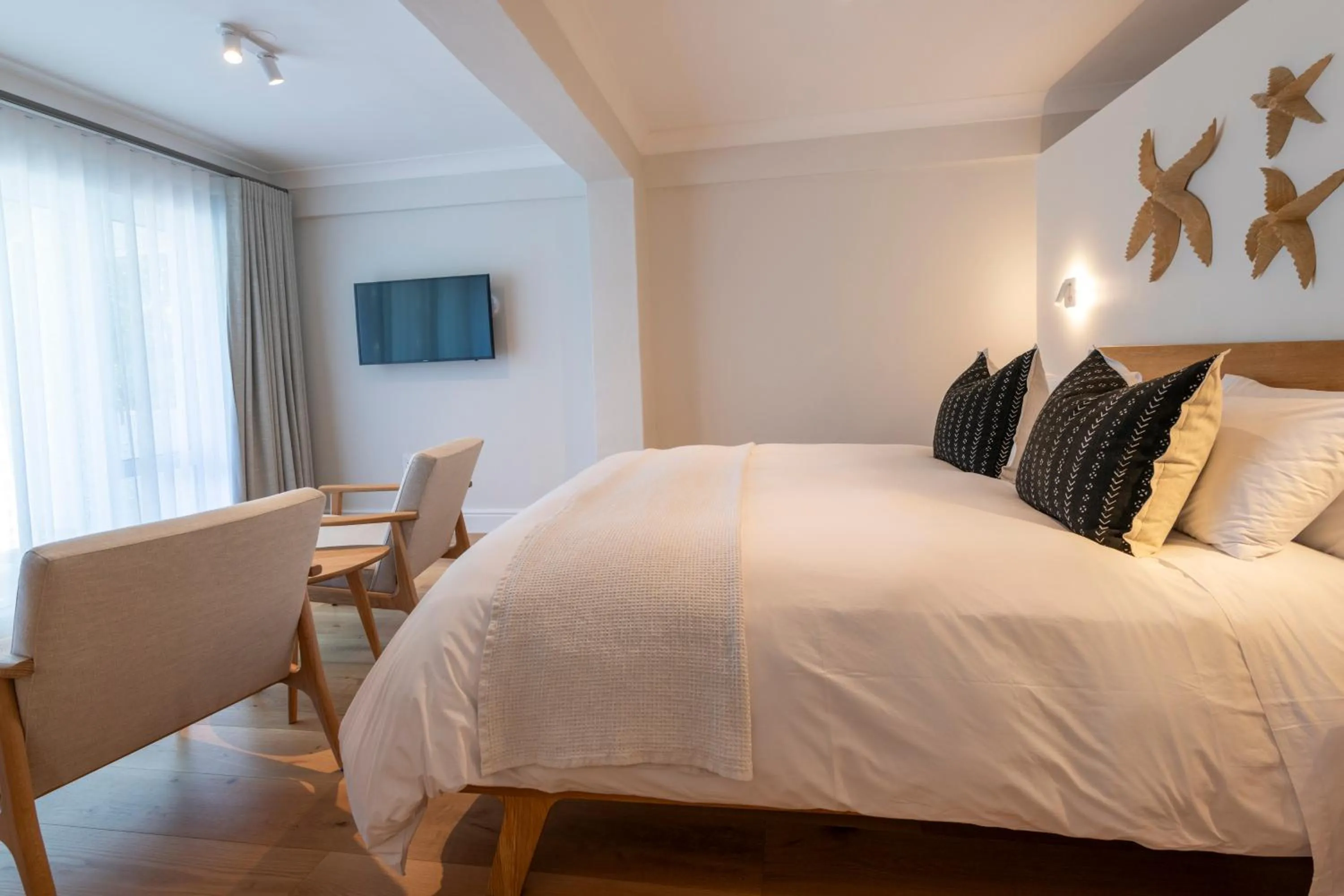 Bed in Hide-Away Guest House