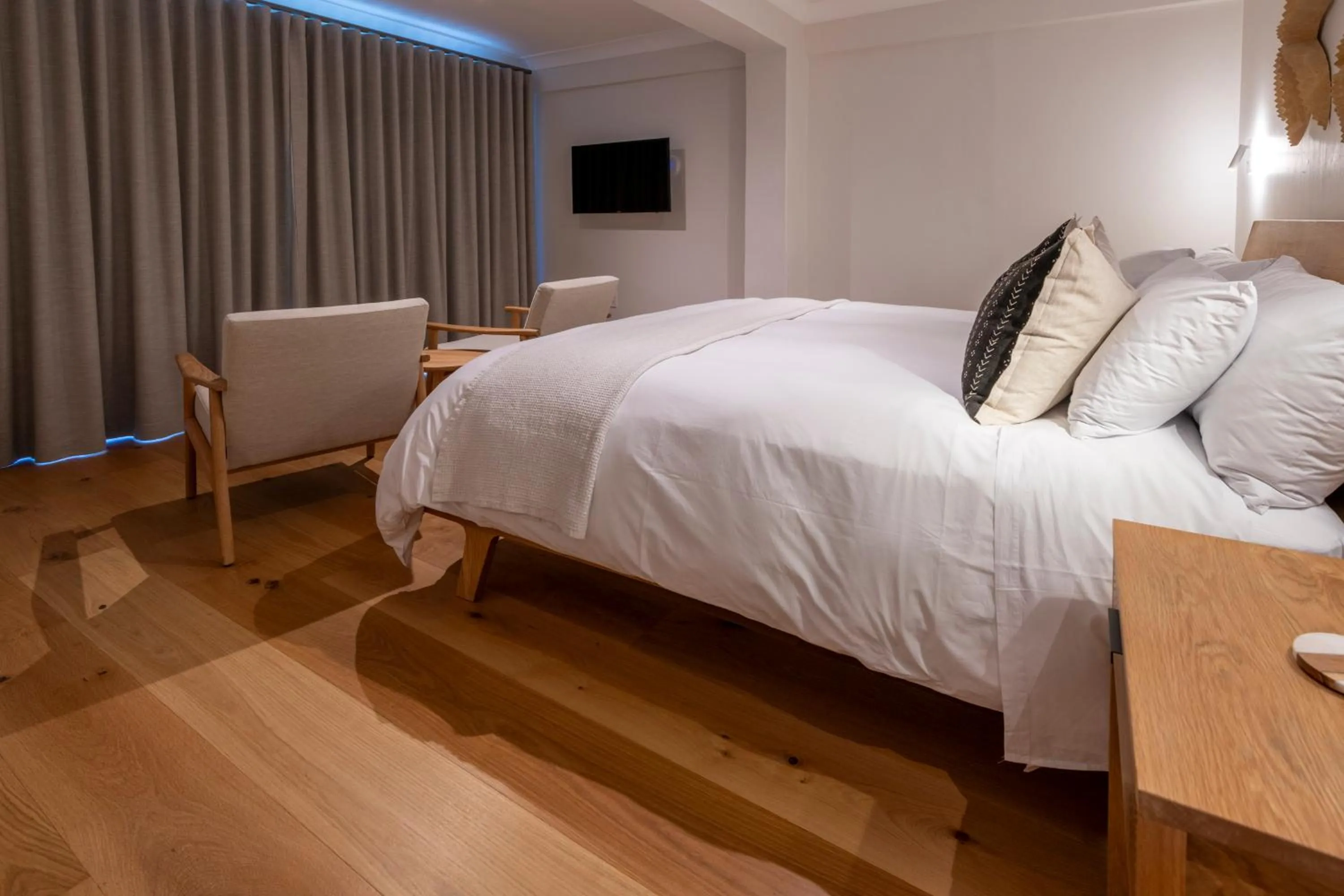 Bed in Hide-Away Guest House