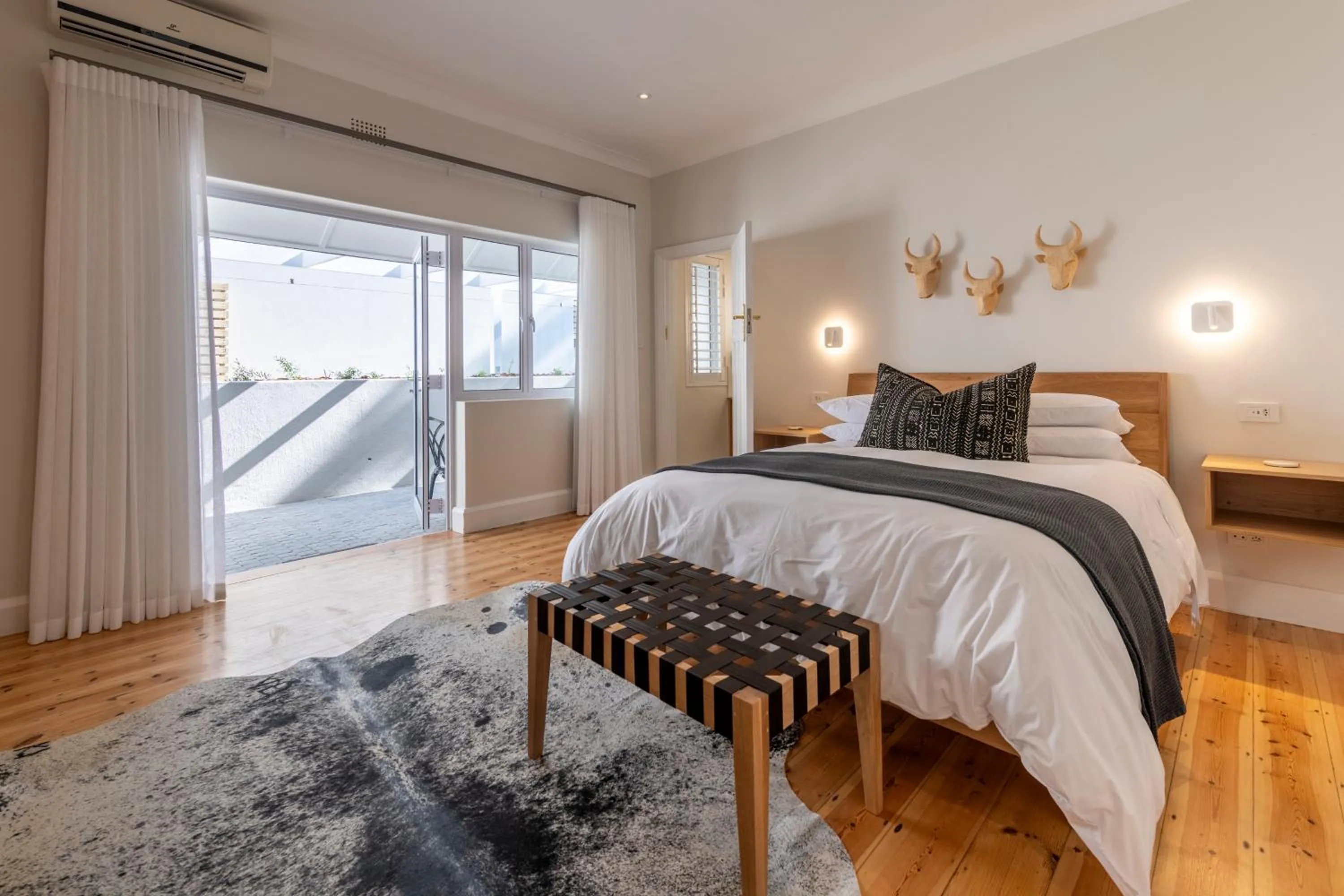 Bed in Hide-Away Guest House