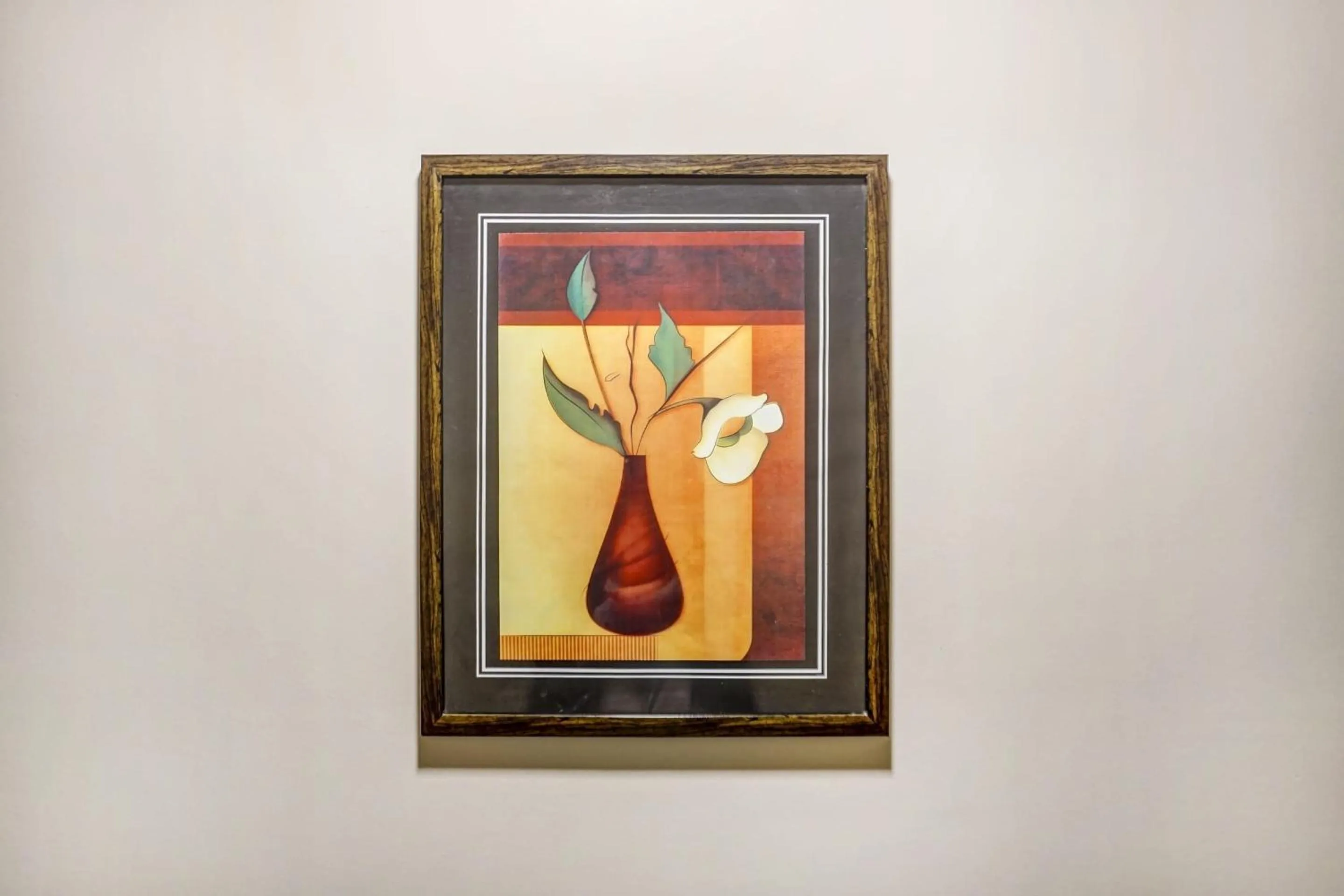 Bedroom in Super Townhouse OAK Regal Inn Near Sant Tukaram Nagar Metro Station