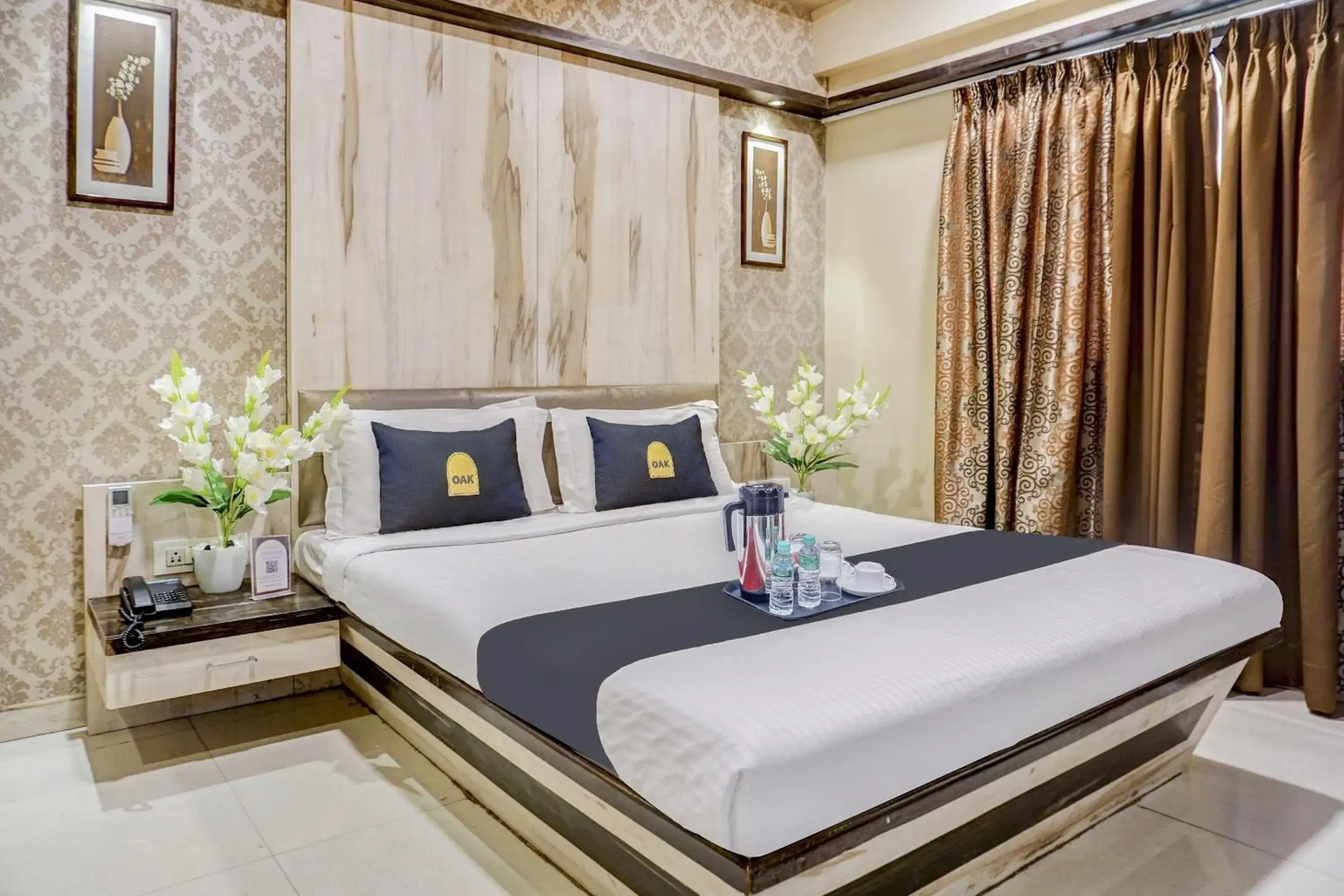 Deluxe Triple Room - single occupancy in Super Townhouse OAK Regal Inn Near Sant Tukaram Nagar Metro Station Deluxe Triple Room - single occupancy in Super Townhouse OAK Regal Inn Near Sant Tukaram Nagar Metro Station
