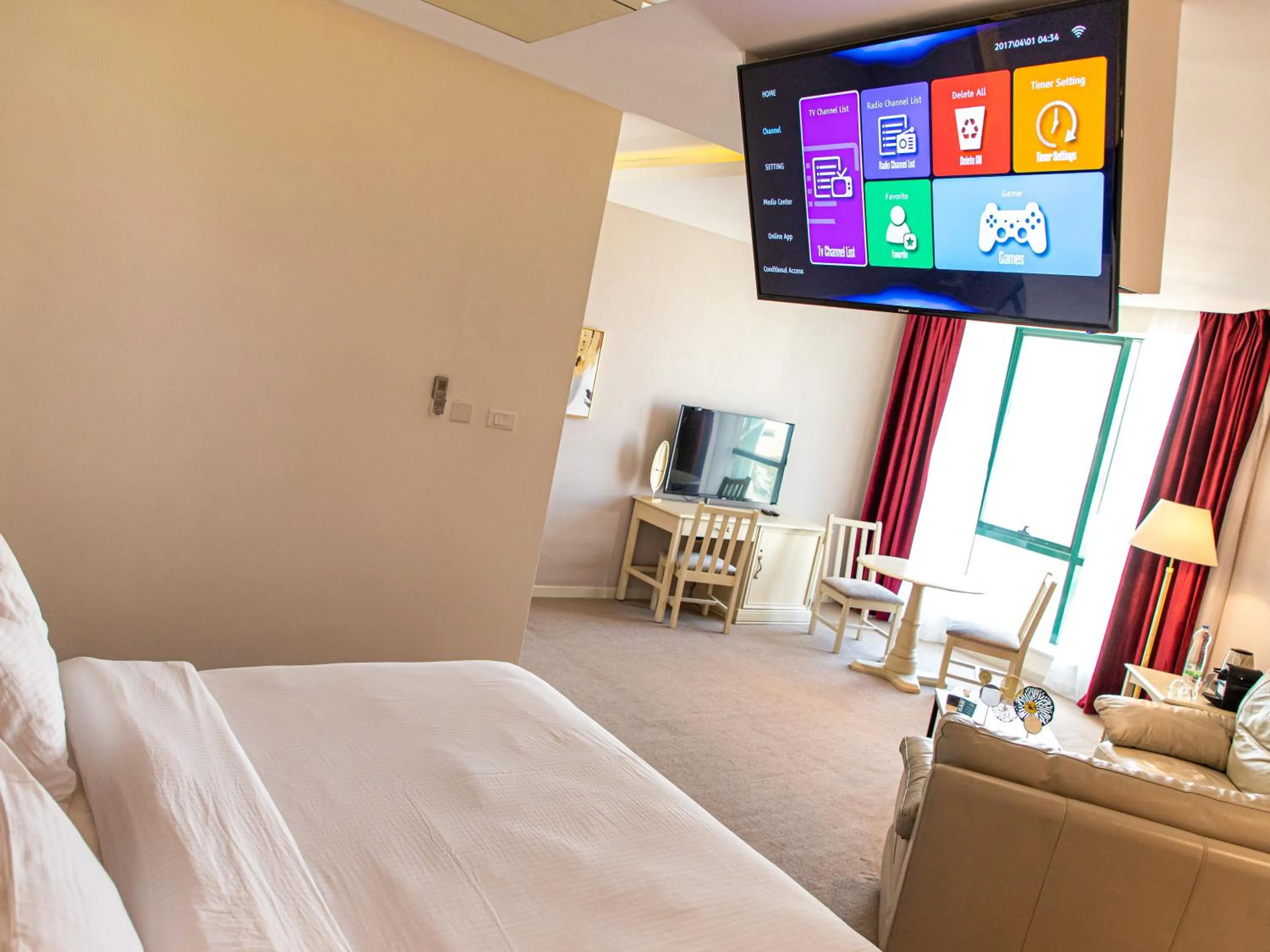 Communal lounge/ TV room, Bed in Amman West Luxury Hotel By Azar