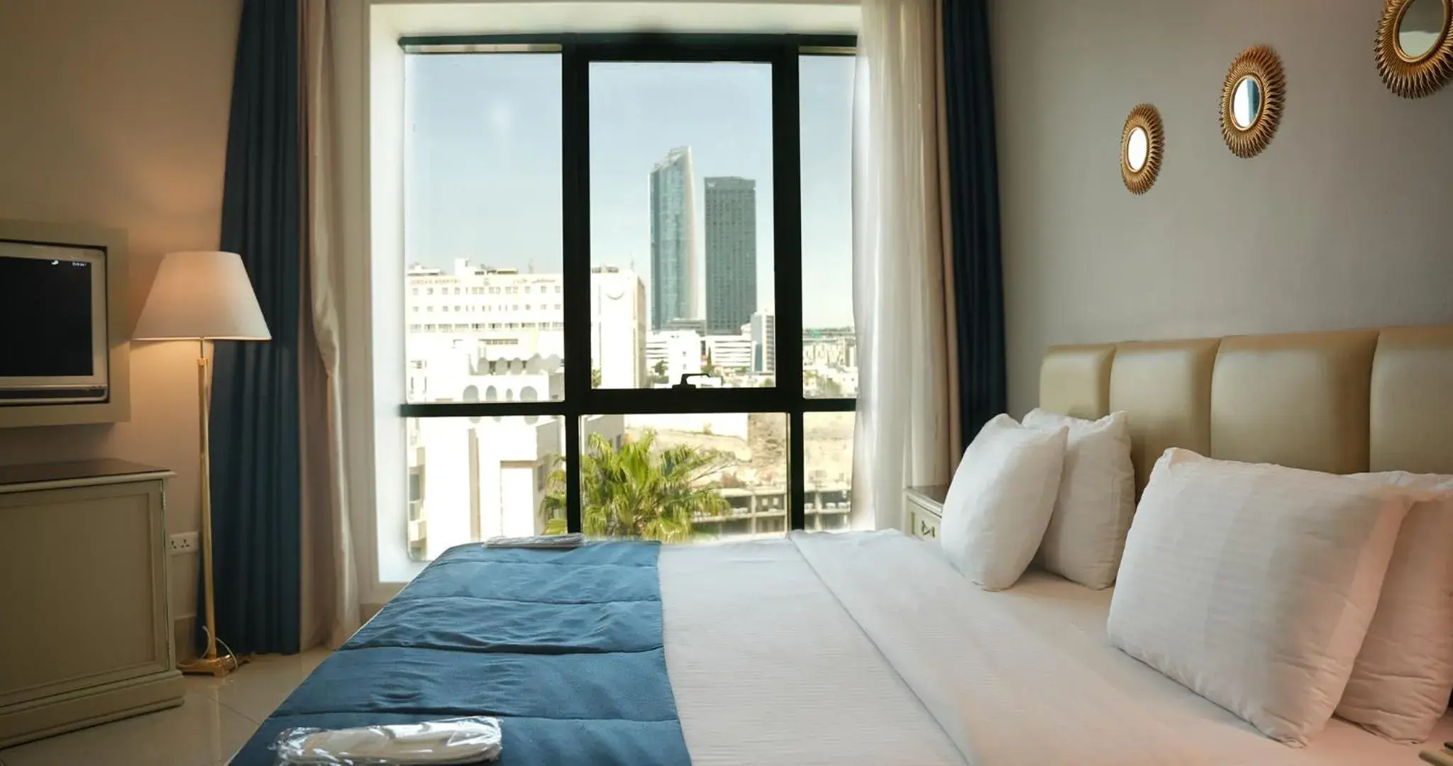 Communal lounge/ TV room, Bed in Amman West Luxury Hotel By Azar Communal lounge/ TV room, Bed in Amman West Luxury Hotel By Azar