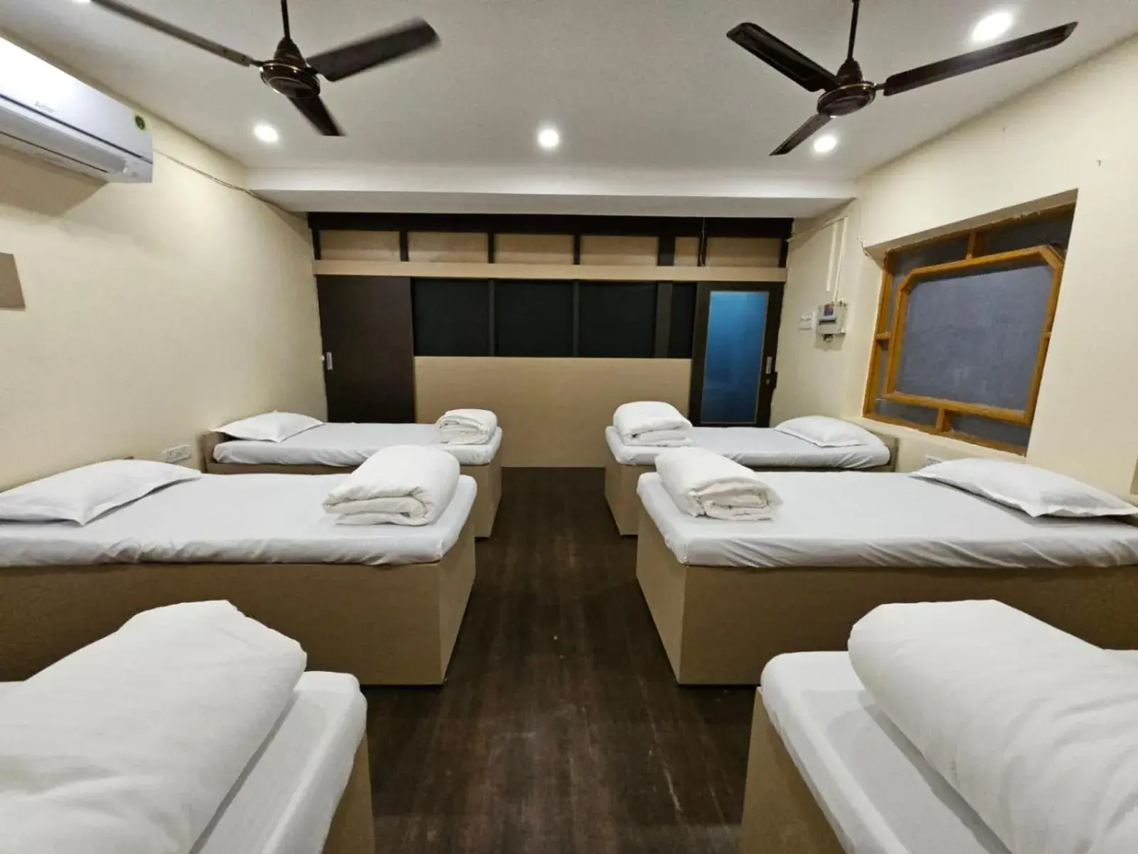 Photo of the whole room, Bed in Hotel Padmini International- Sigra Photo of the whole room, Bed in Hotel Padmini International- Sigra