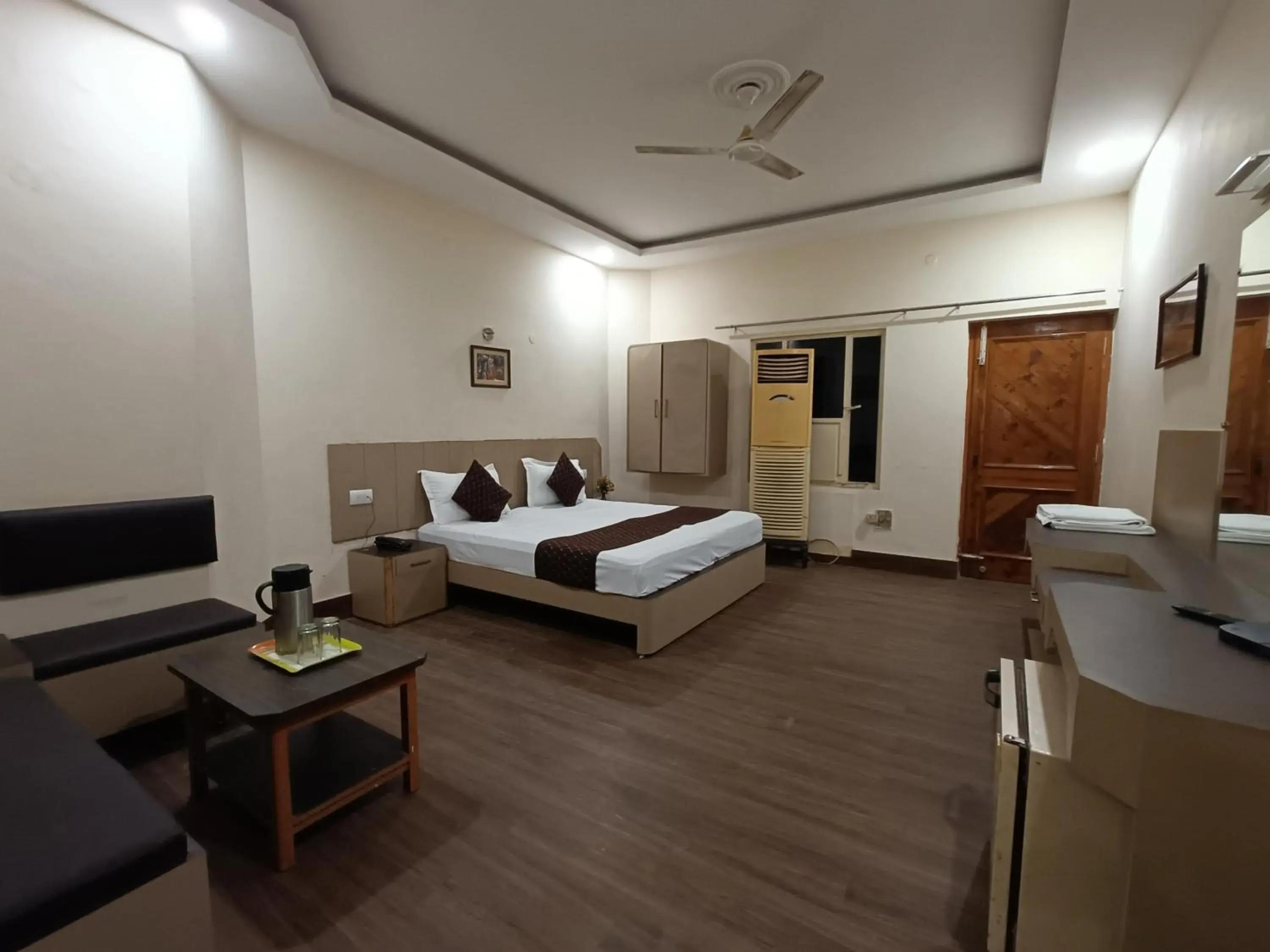 Bed in Hotel Padmini International- Sigra Bed in Hotel Padmini International- Sigra