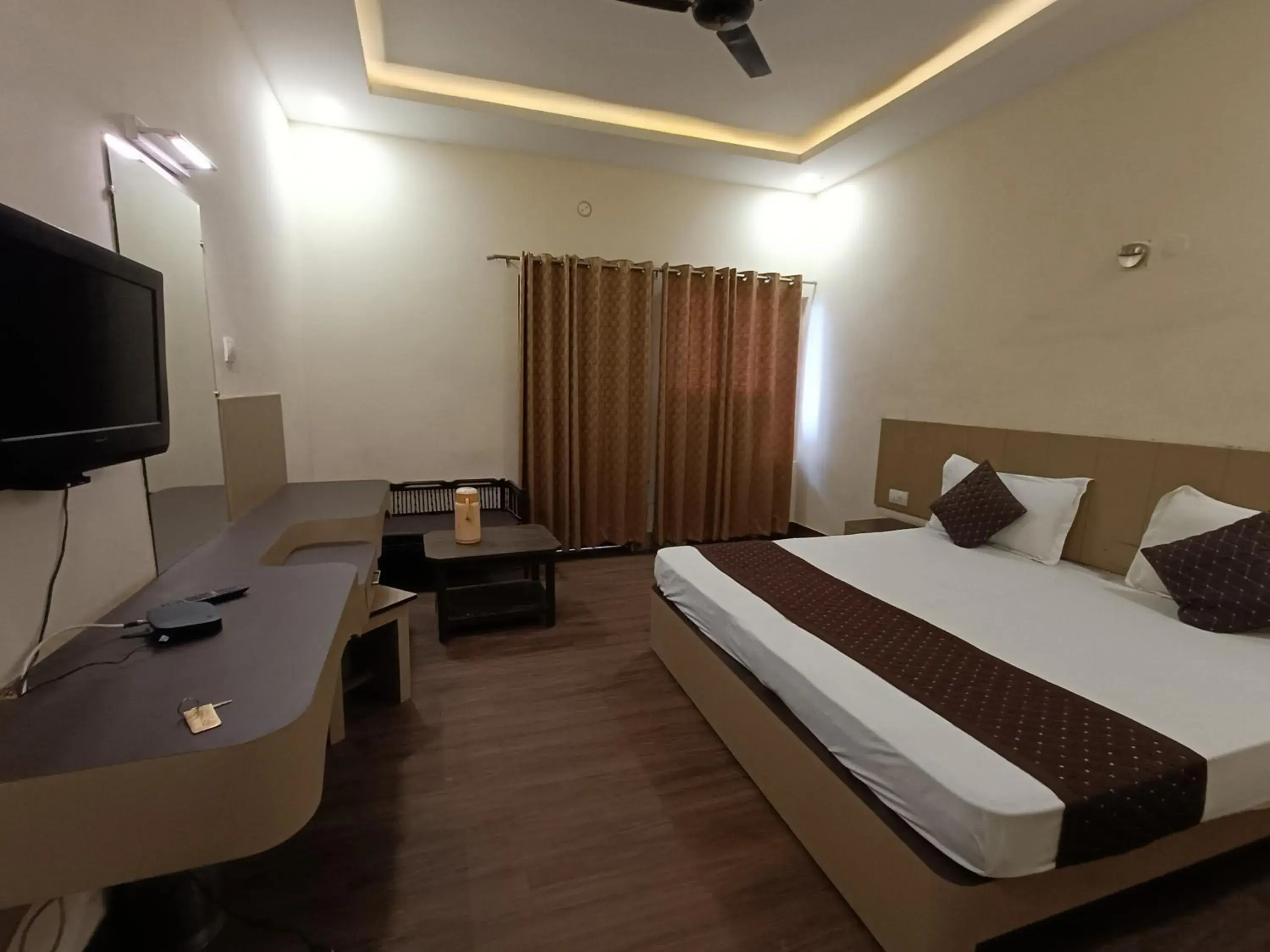 Bed in Hotel Padmini International- Sigra Bed in Hotel Padmini International- Sigra