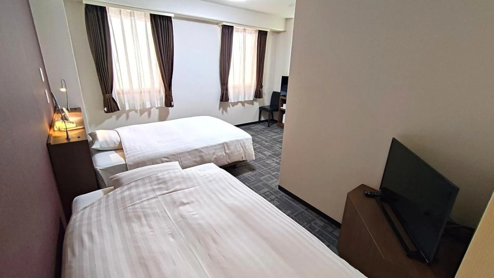 Photo of the whole room, Bed in Hotel Wing International Sukagawa
