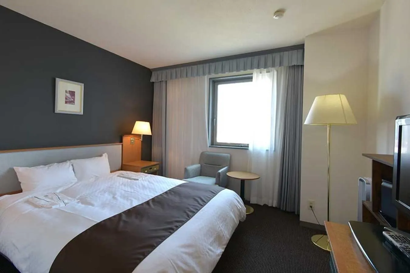 Photo of the whole room, Bed in Blossom Hotel Hirosaki