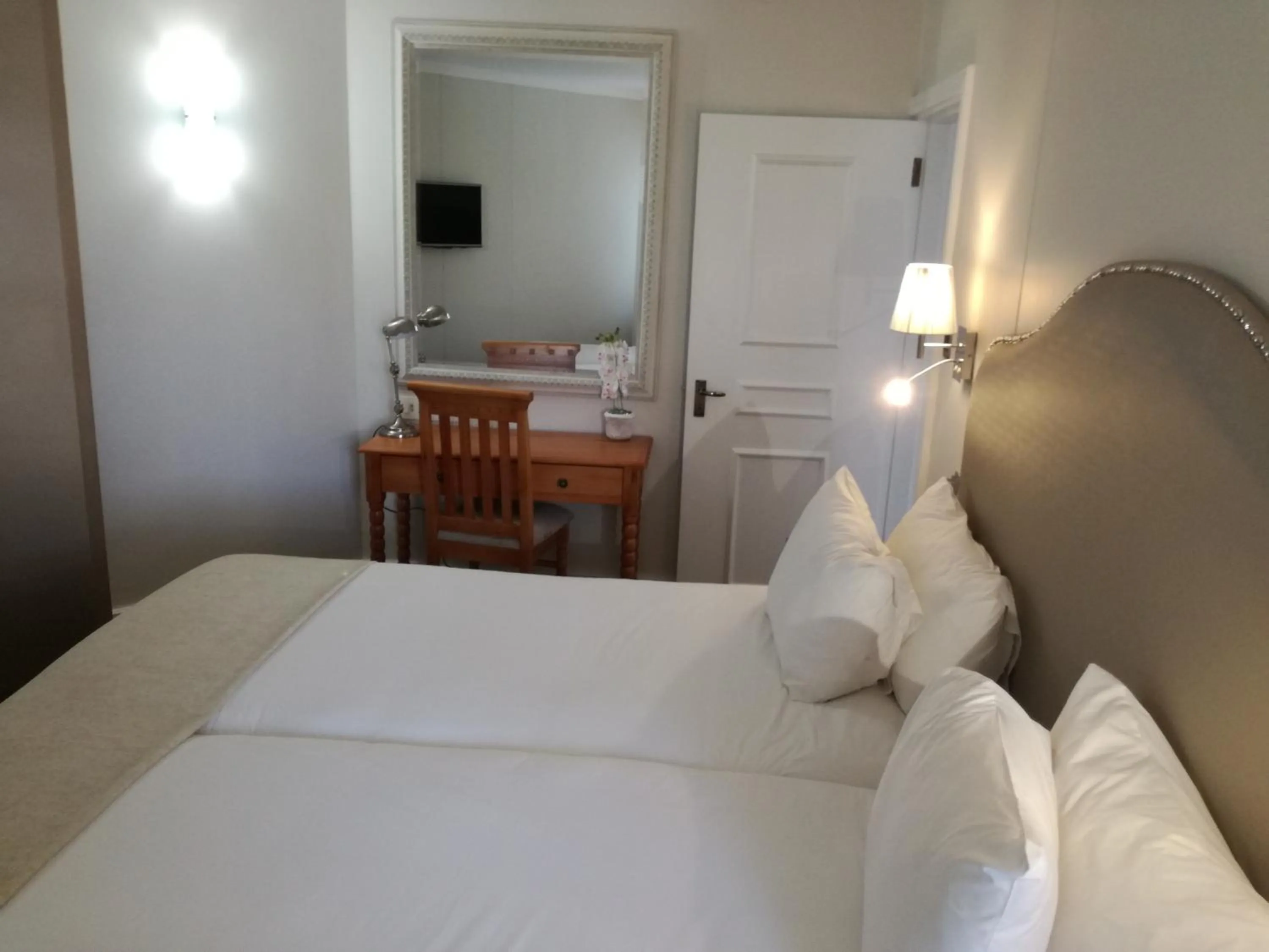 Bed in The Riverside Hotel