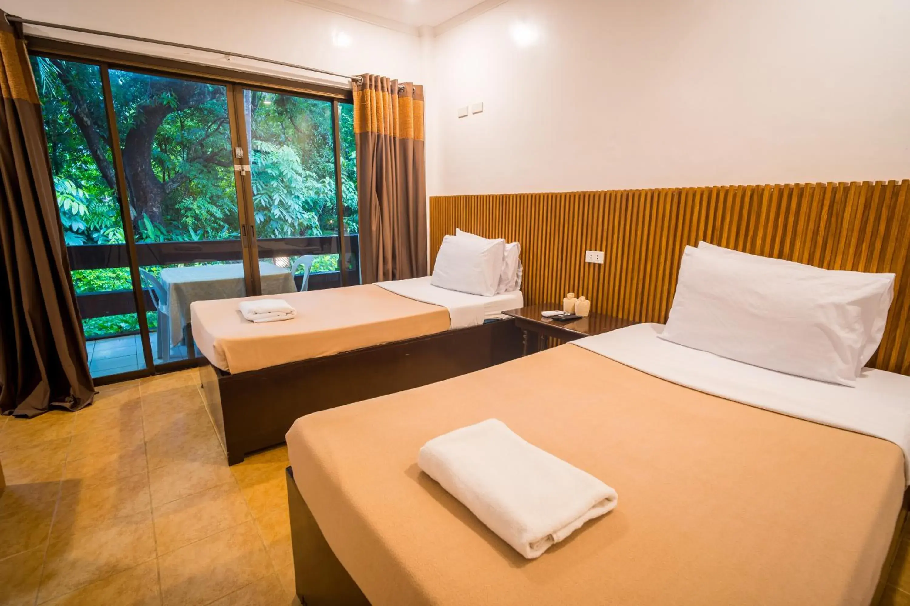 Bed in Lisland Rainforest Resort Bed in Lisland Rainforest Resort