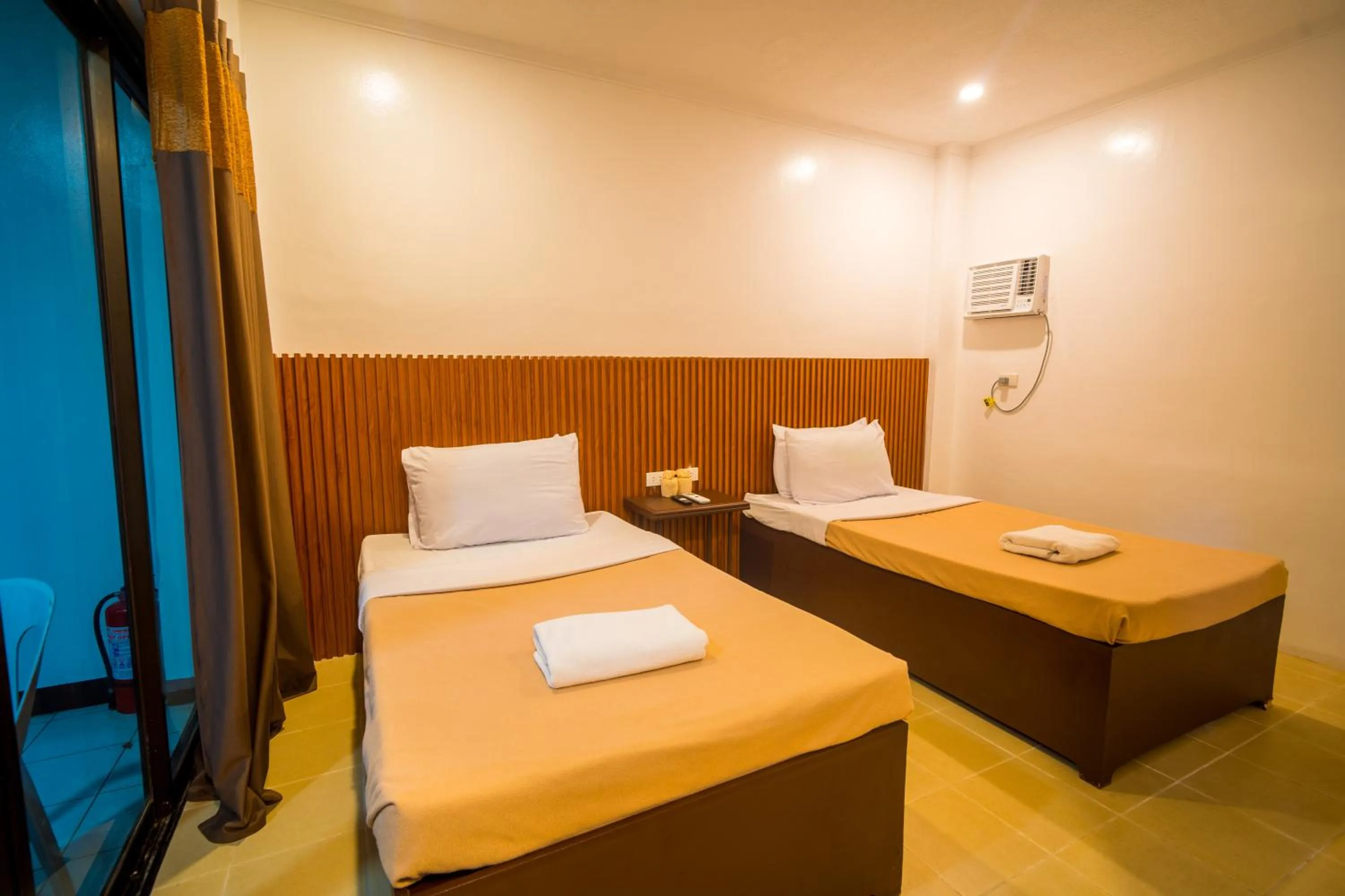 Bed in Lisland Rainforest Resort