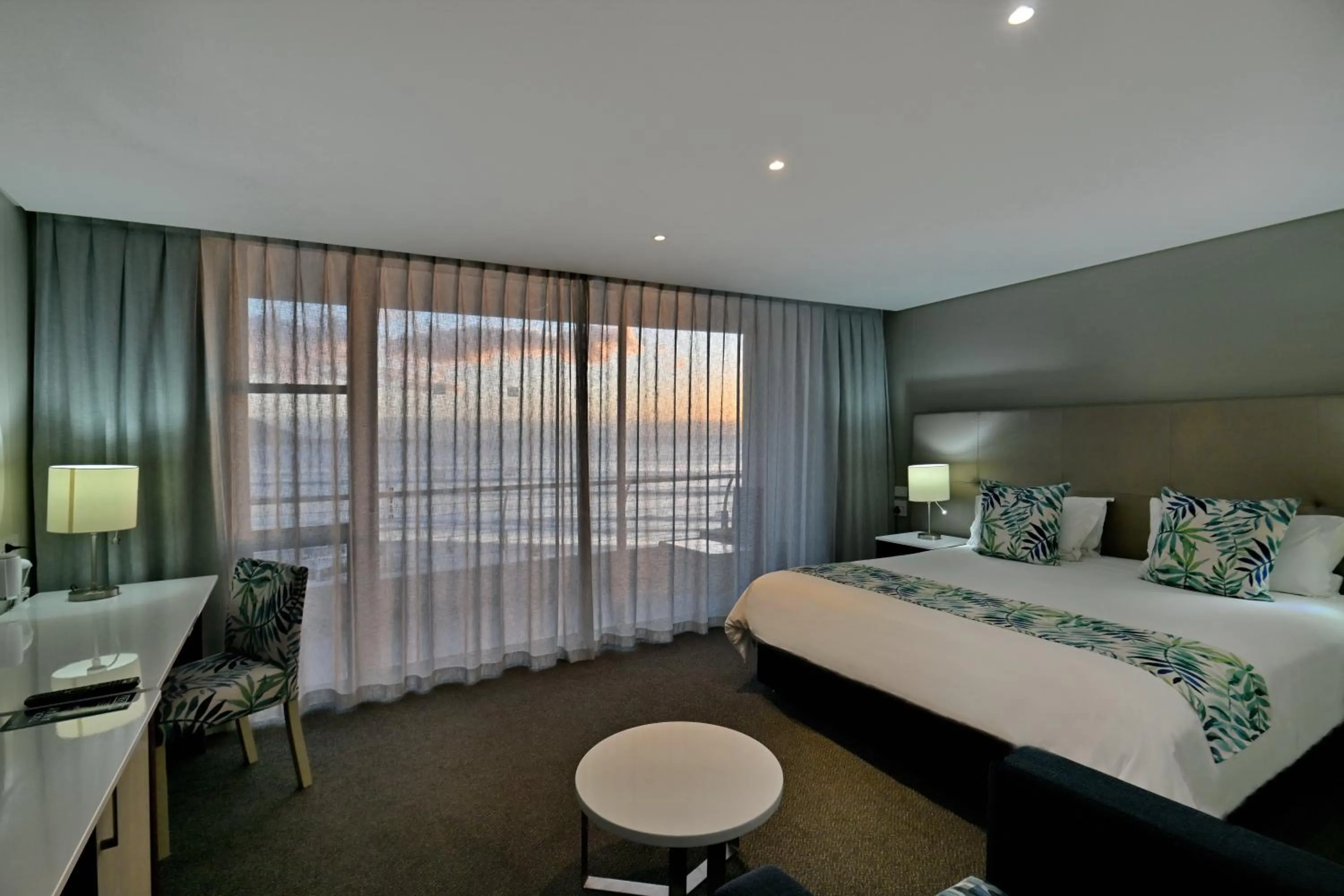 Bed in Lagoon Beach Hotel & Spa