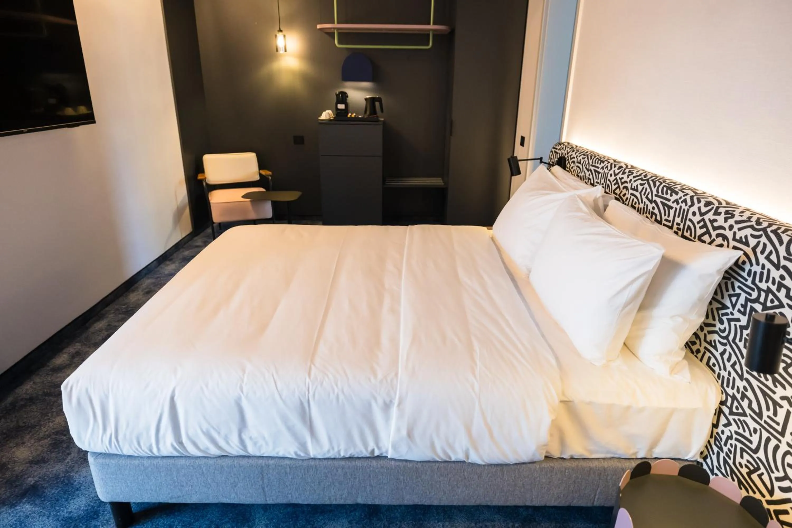 Bed in Mercure Bucharest Cantemir