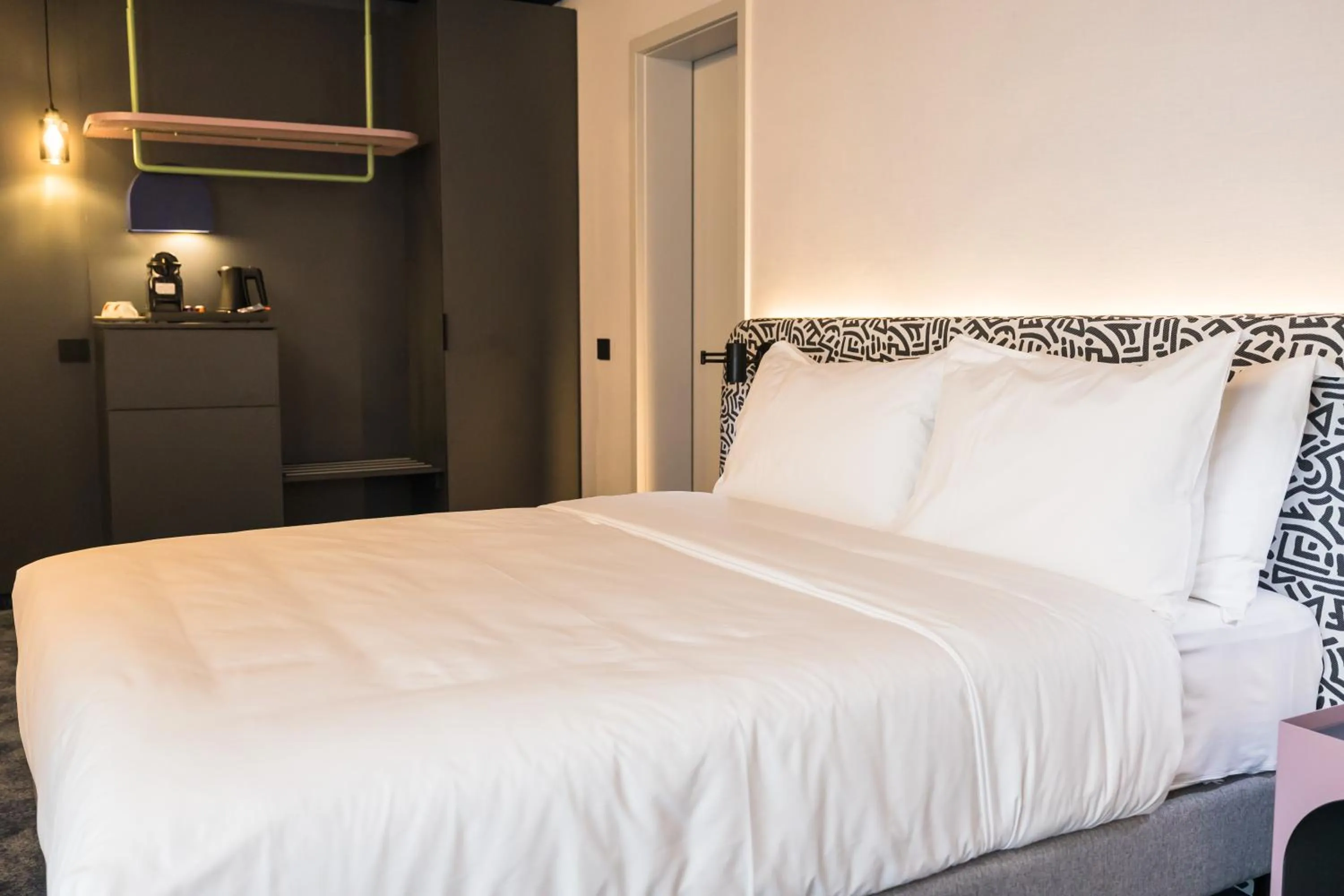 Bed in Mercure Bucharest Cantemir