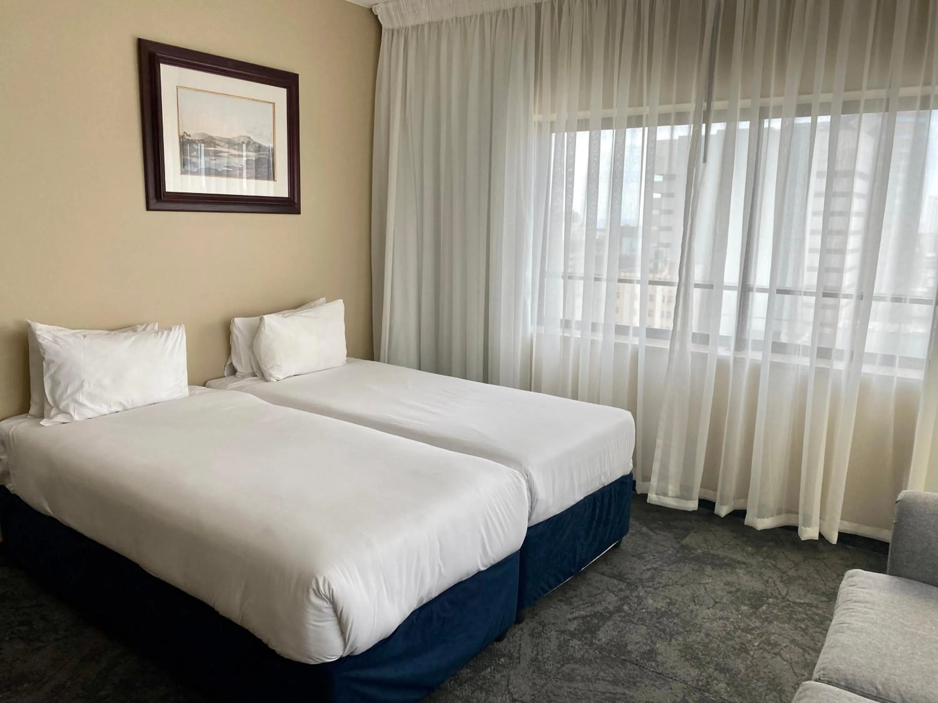 Bed in The Royal Hotel by Coastlands Hotels & Resorts