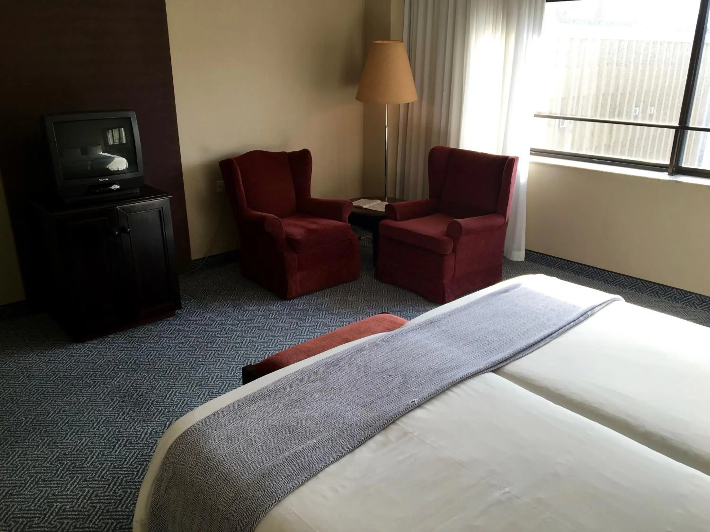 TV and multimedia, Bed in The Royal Hotel by Coastlands Hotels & Resorts TV and multimedia, Bed in The Royal Hotel by Coastlands Hotels & Resorts
